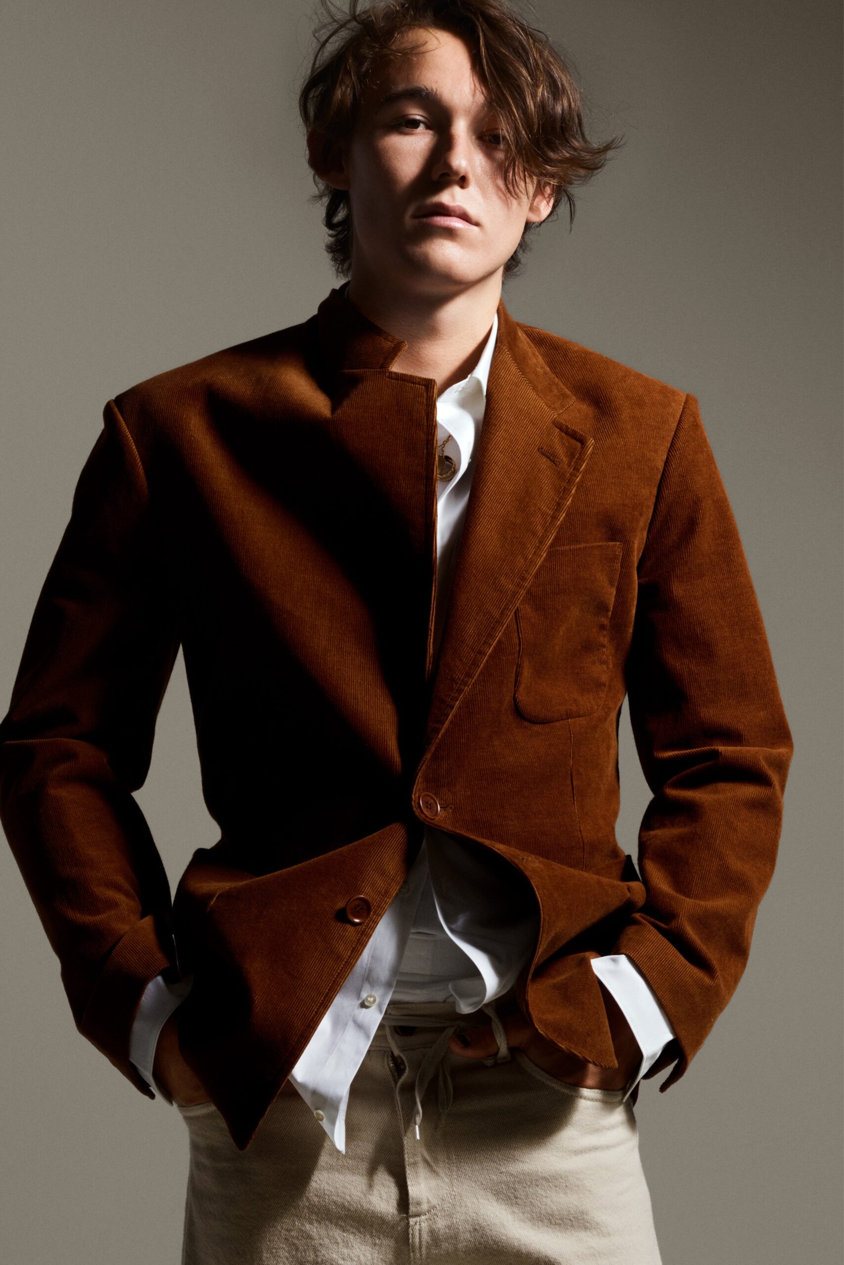 brown tailored blazer with white shirt