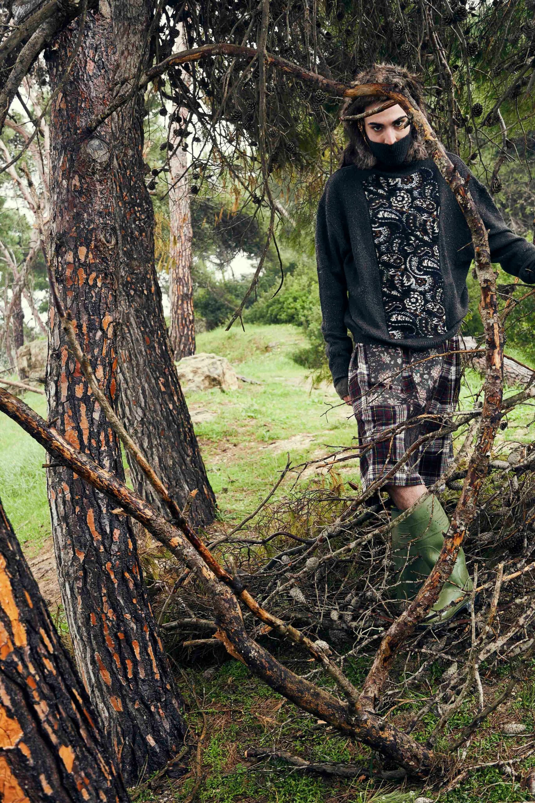 black wool relaxed sweater with plaid shorts