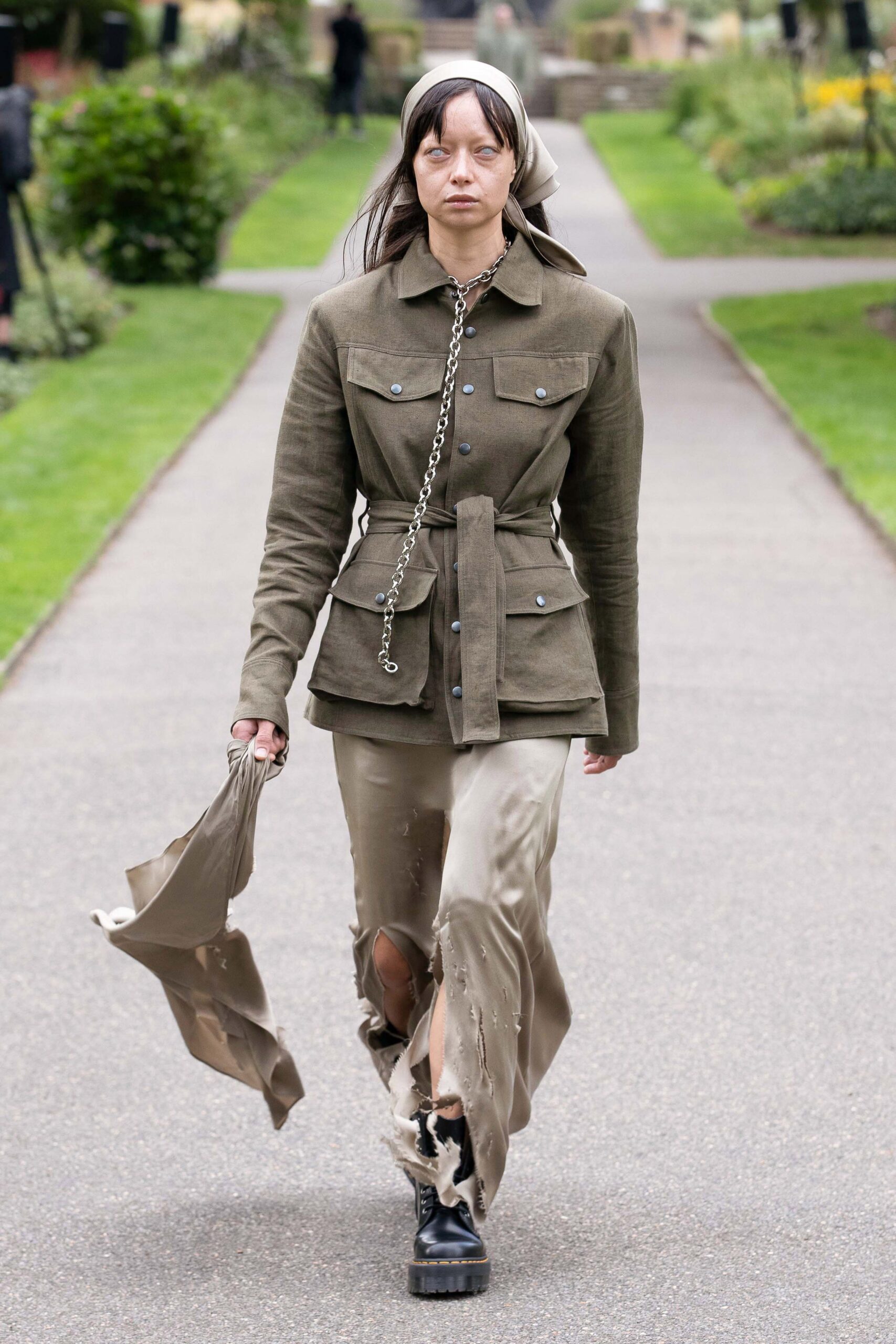 brown fitted jacket with distressed pants