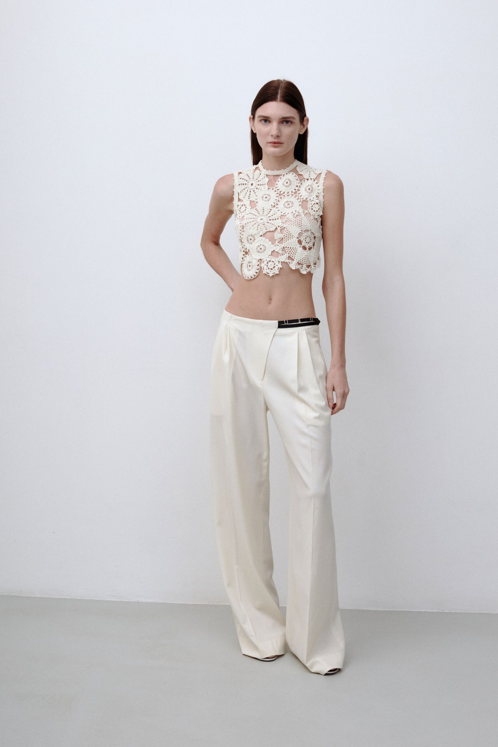 white lace sleeveless high-neck fitted cropped top