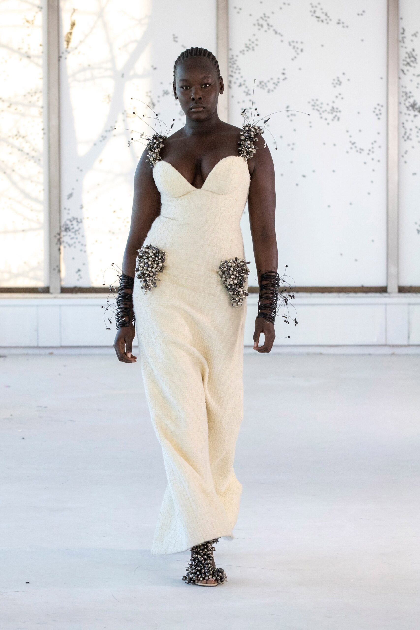 white fitted sleeveless gown