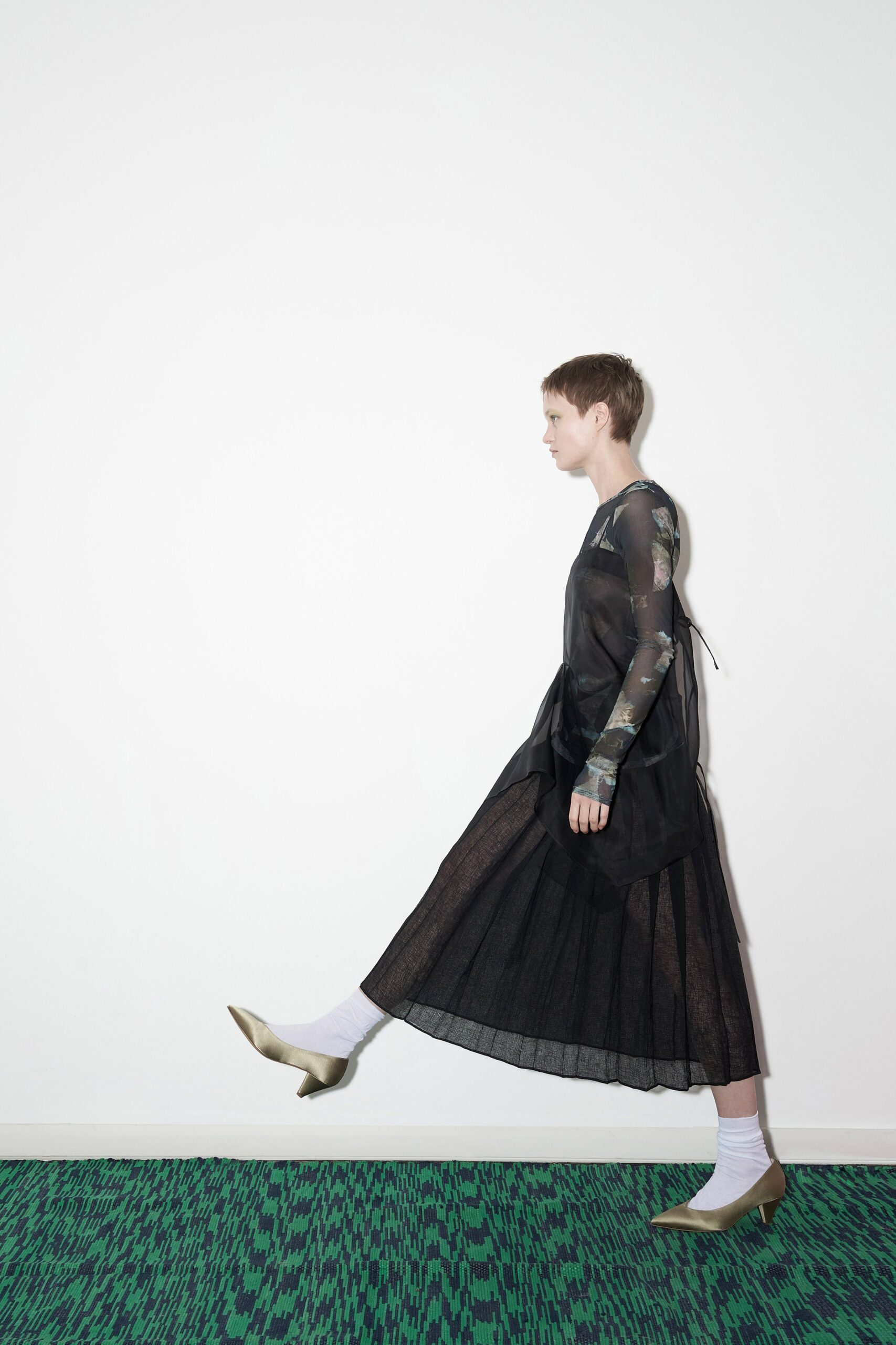black midi dress with green top