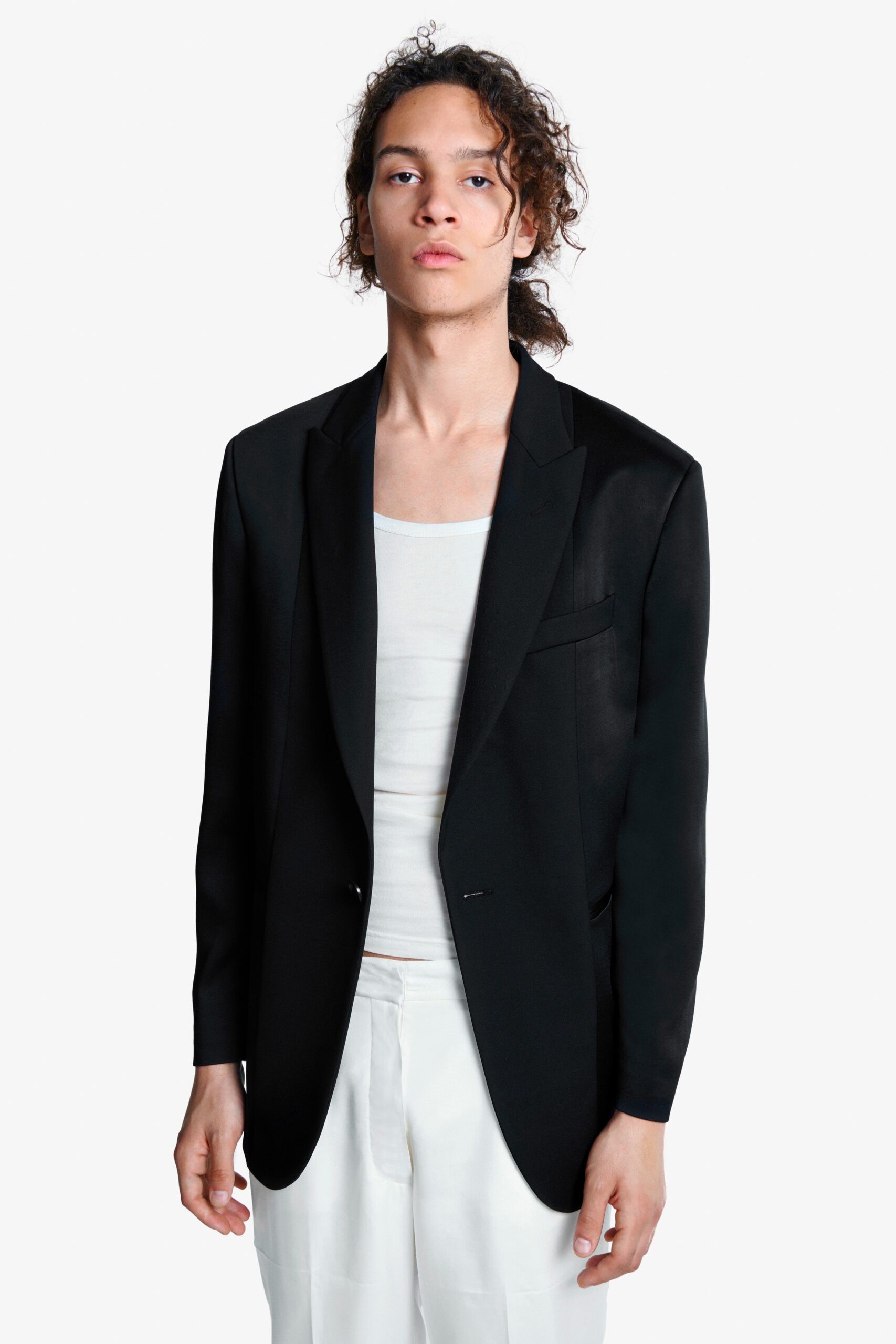 black tailored blazer and white tank-top