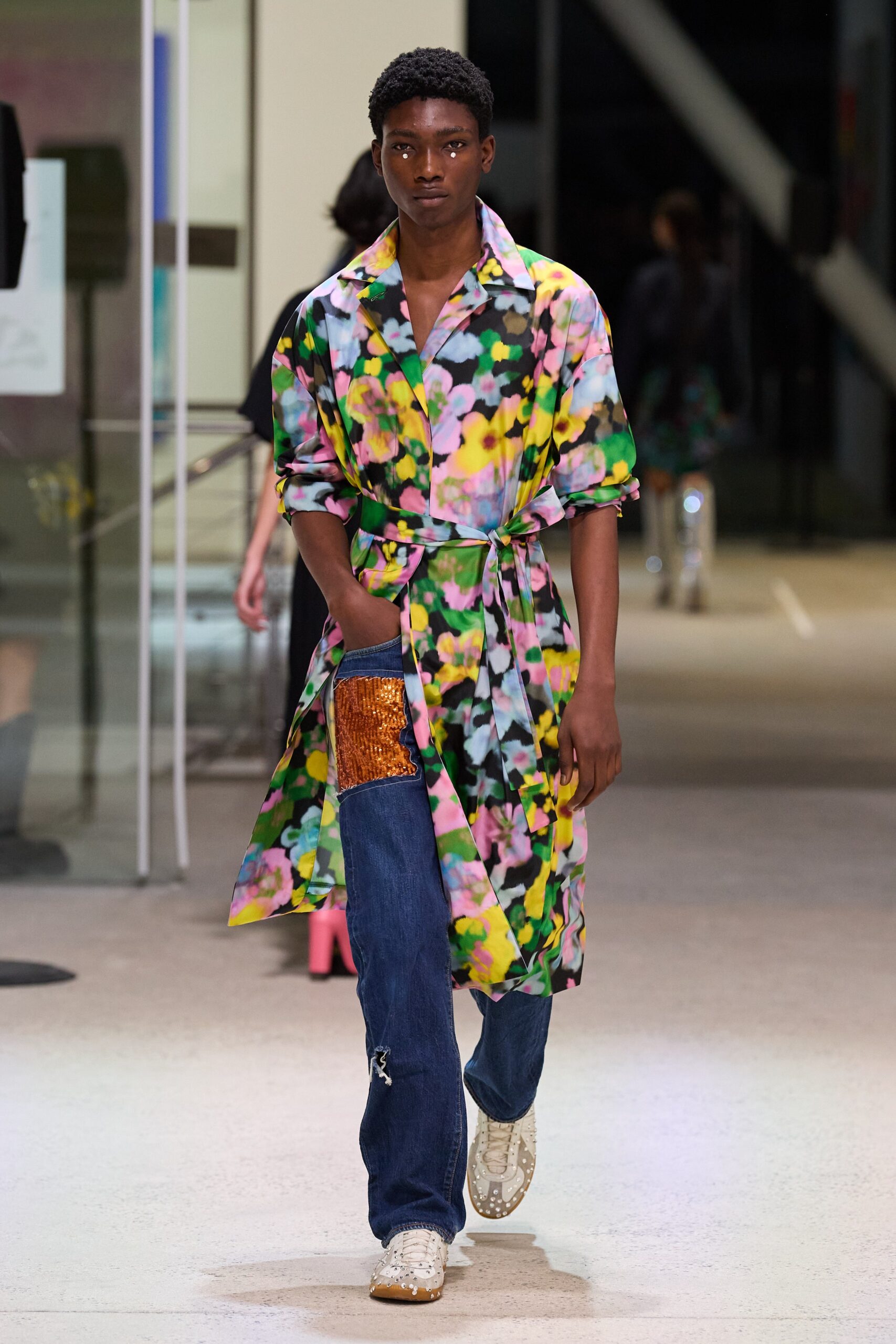 multi-colored belted coat with jeans