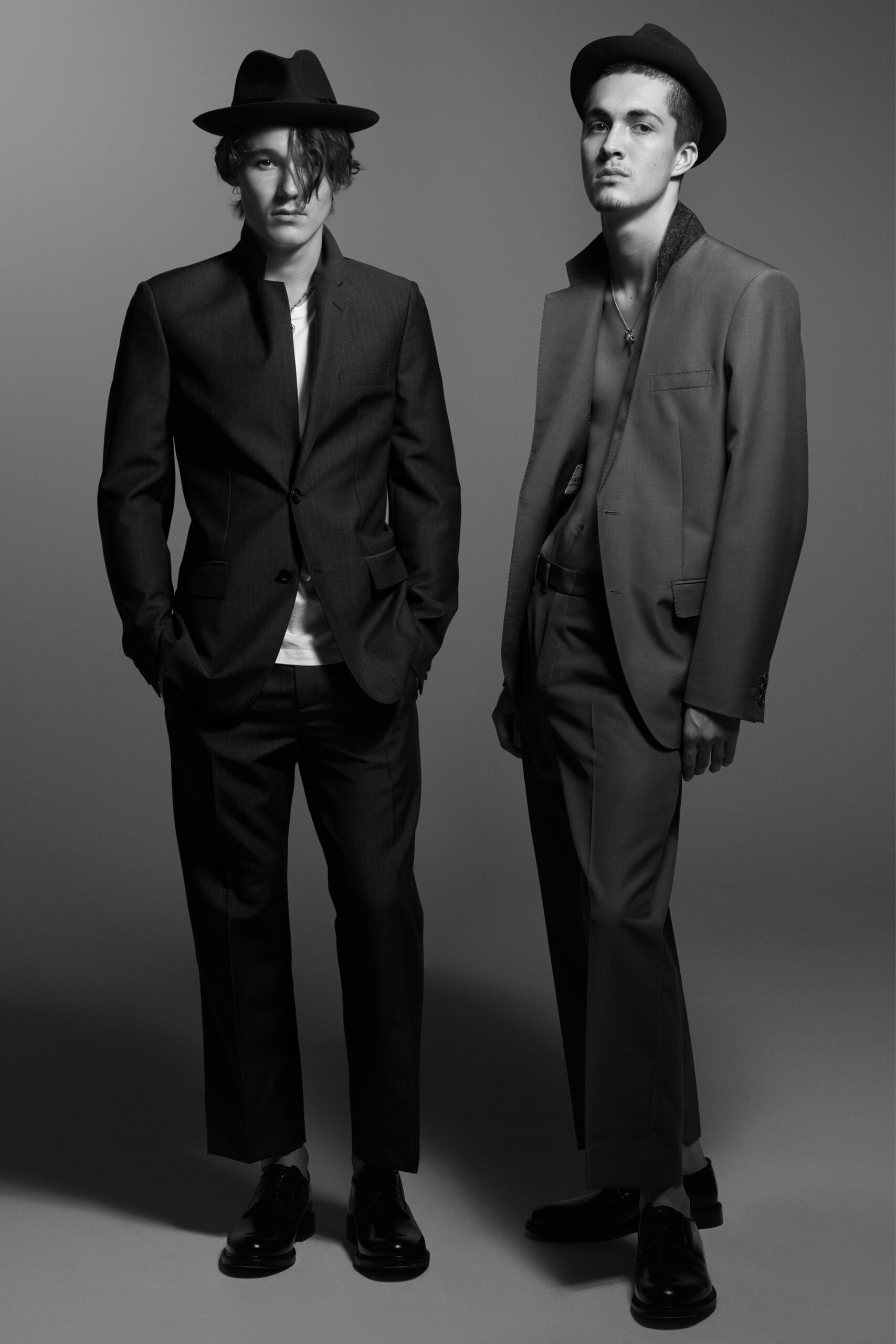 black and gray tailored suits