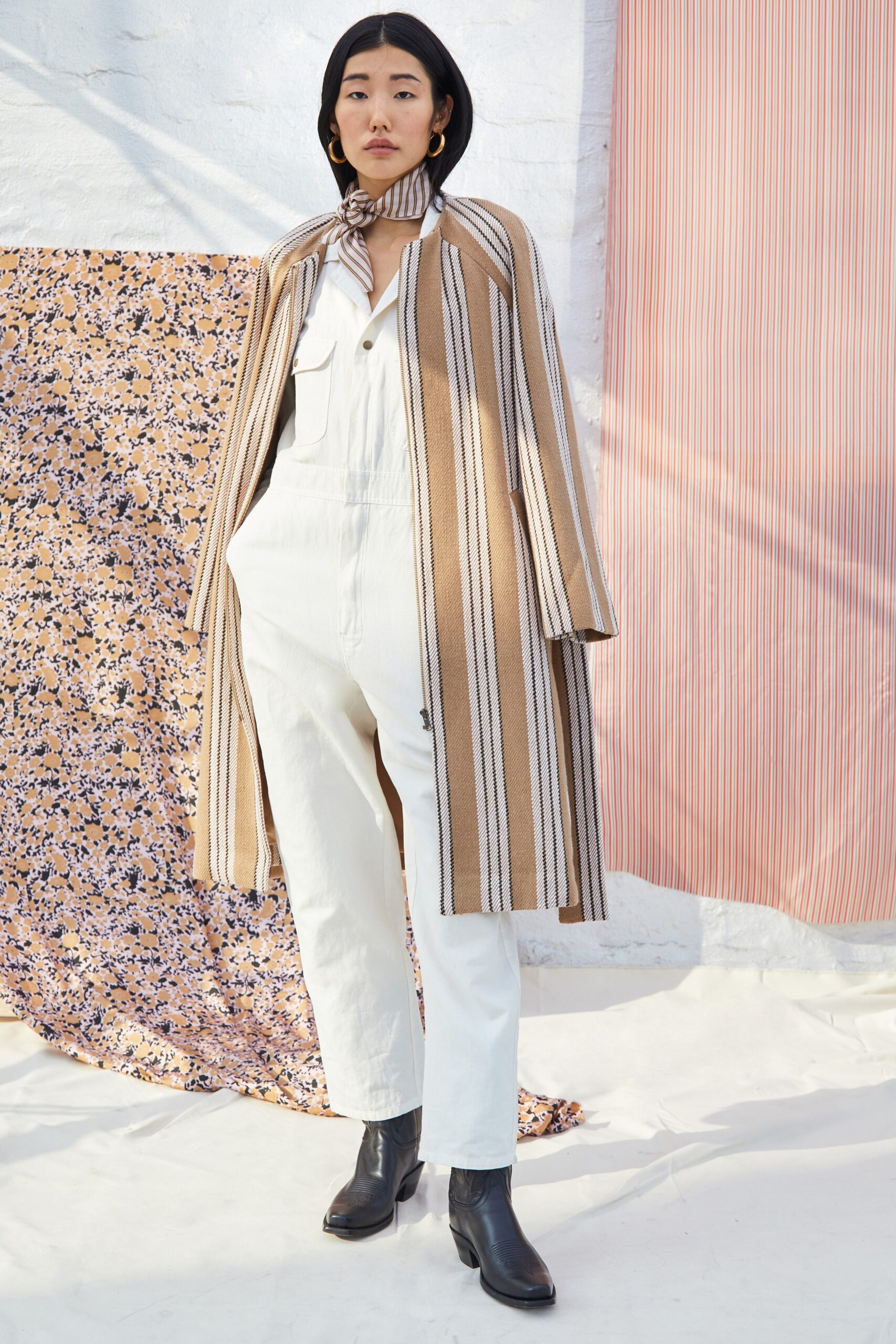 beige striped coat with white jumpsuit