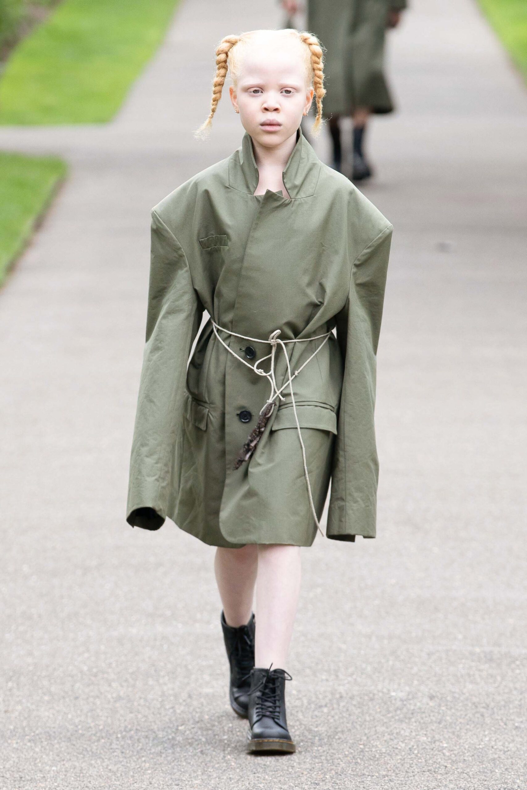 oversized green coat with black boots