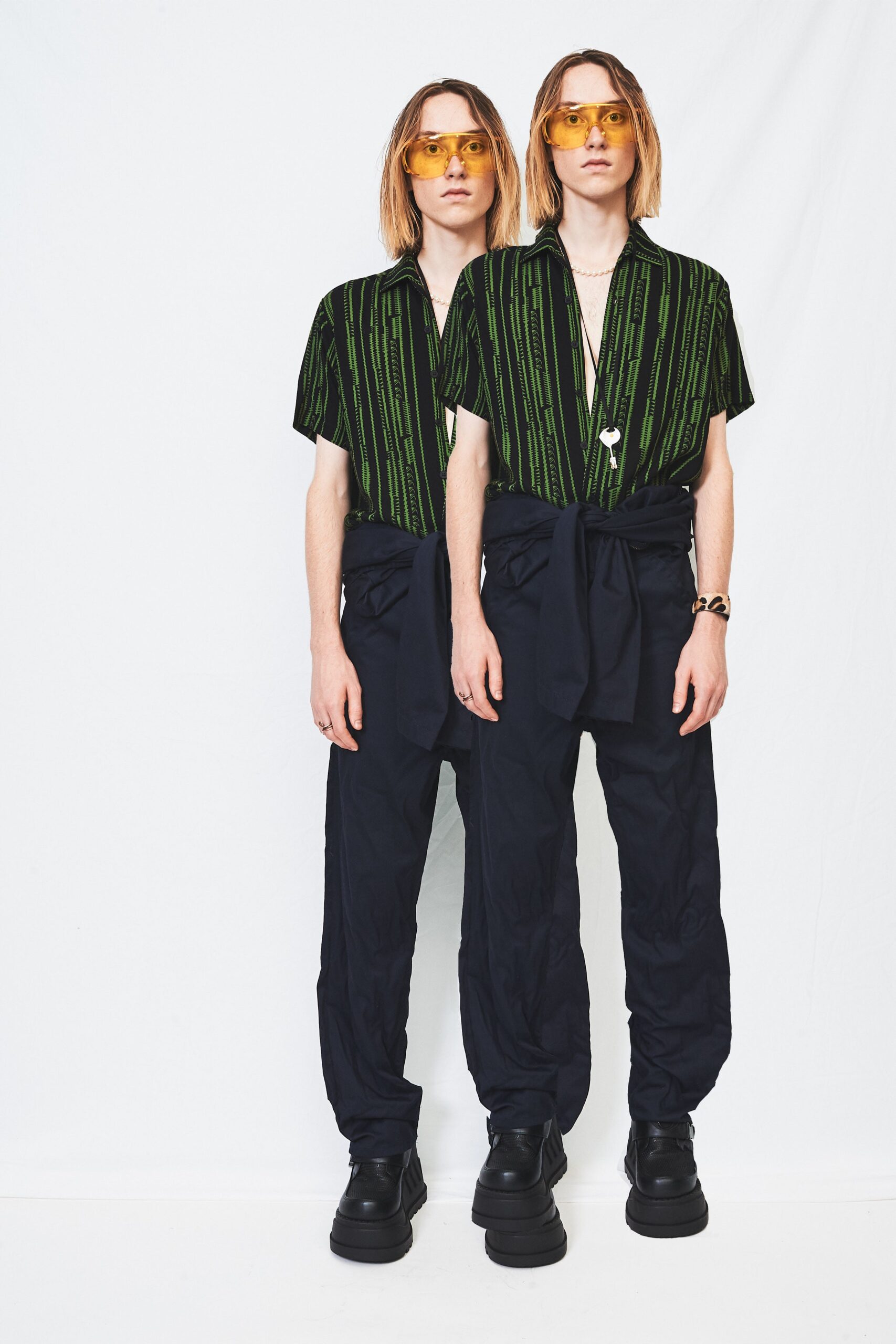 green striped shirt with navy pants