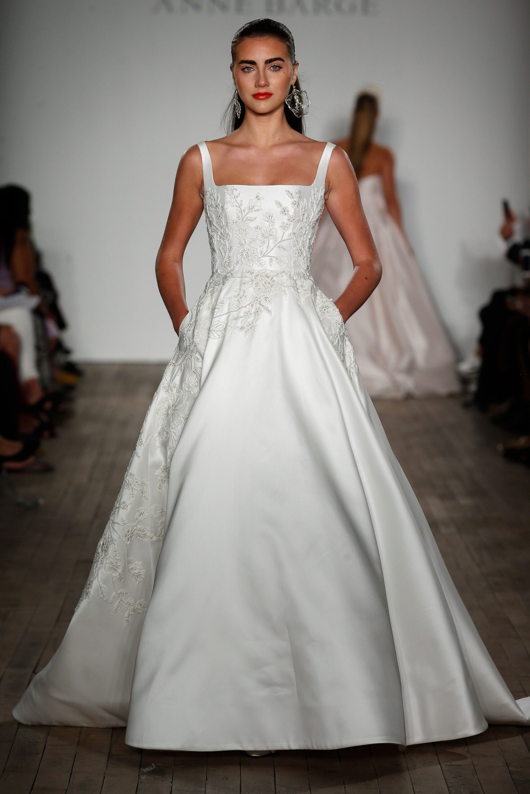 white silk embroidered gown