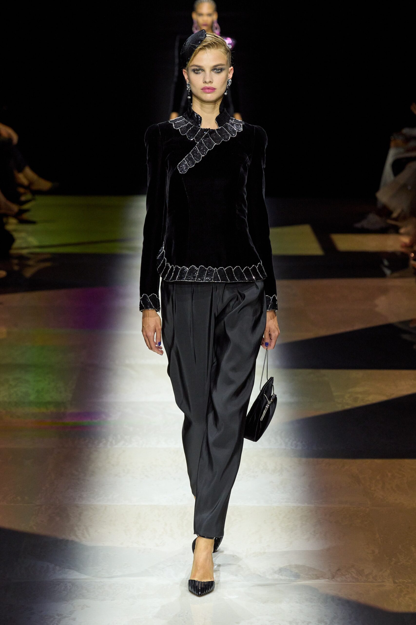 black velvet top with pleated pants