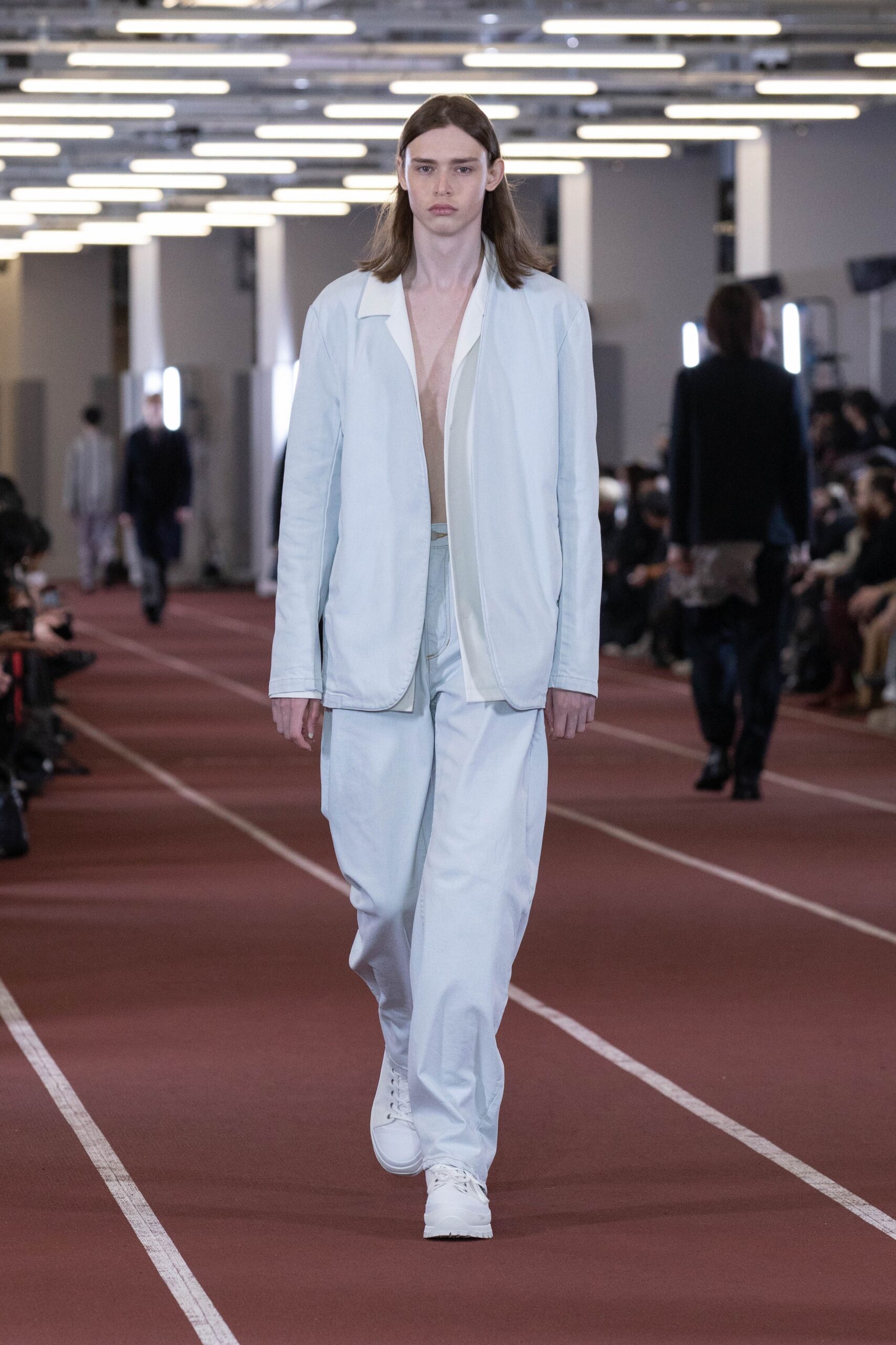 white relaxed jacket with light blue pants