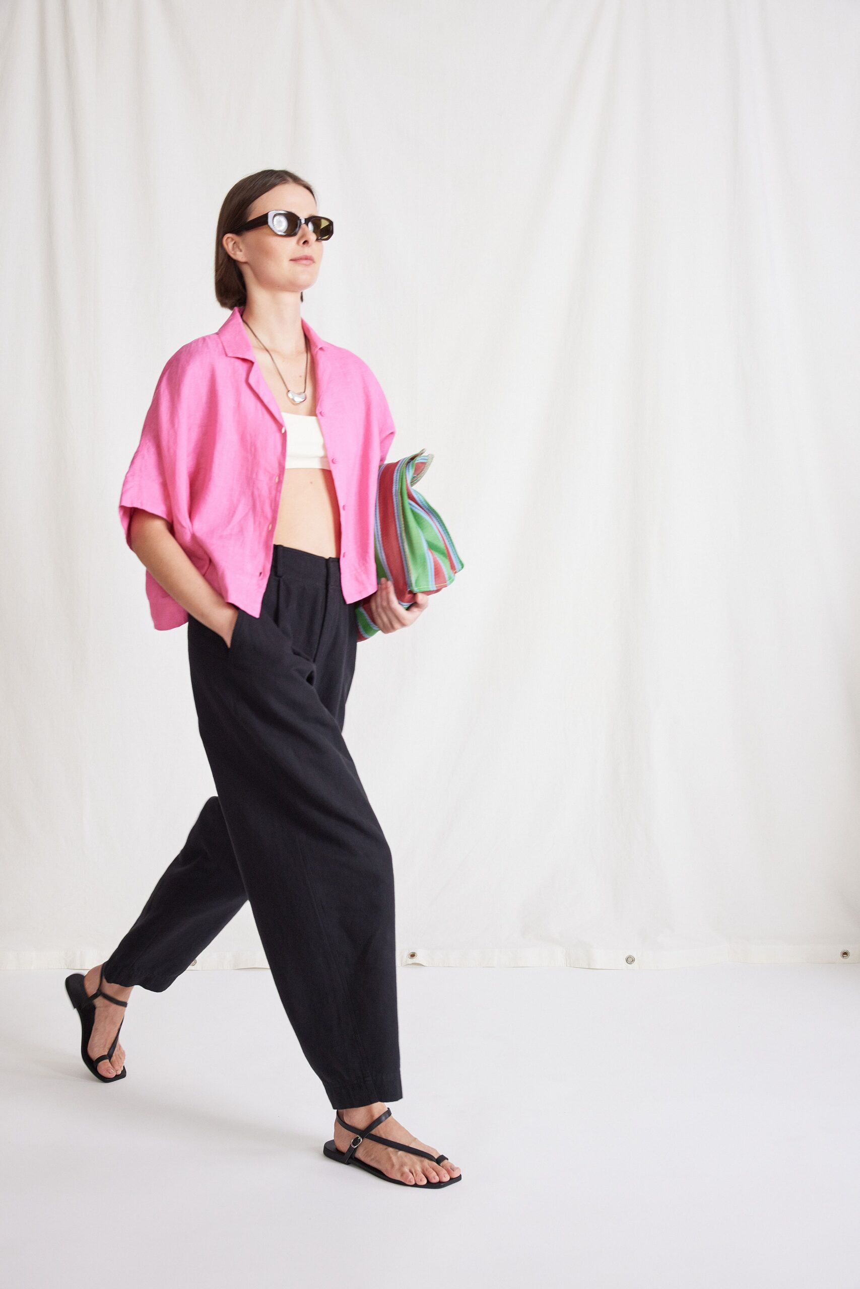 pink relaxed top with black pants
