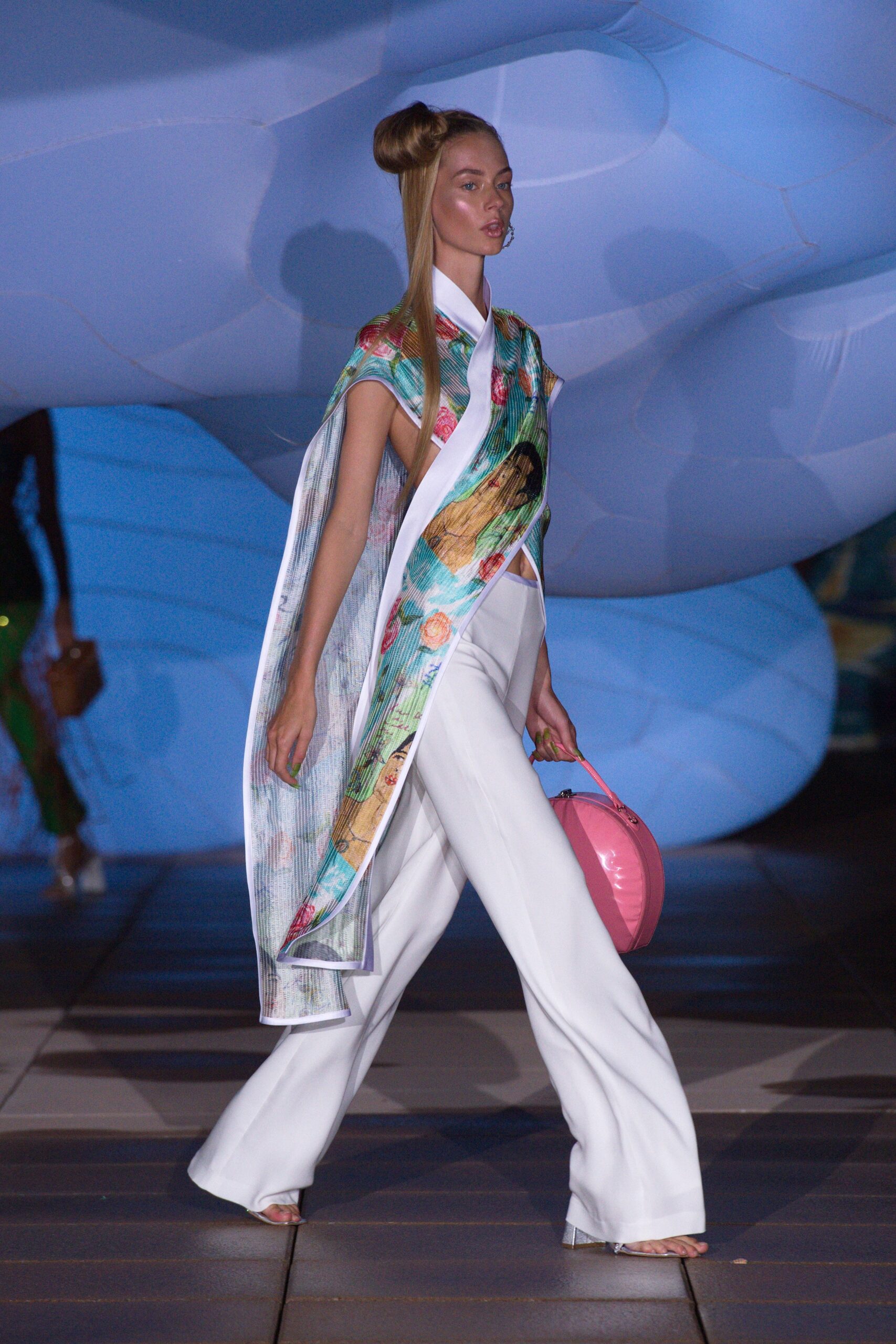 white fitted pants with multi-colored cape