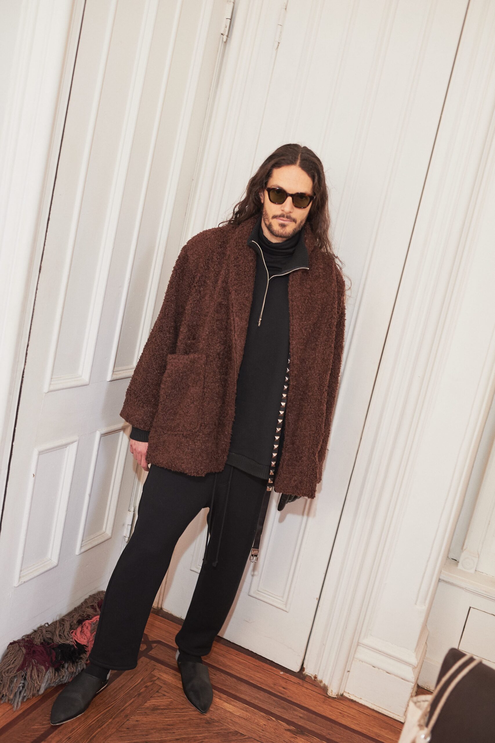 brown faux-fur jacket with black top