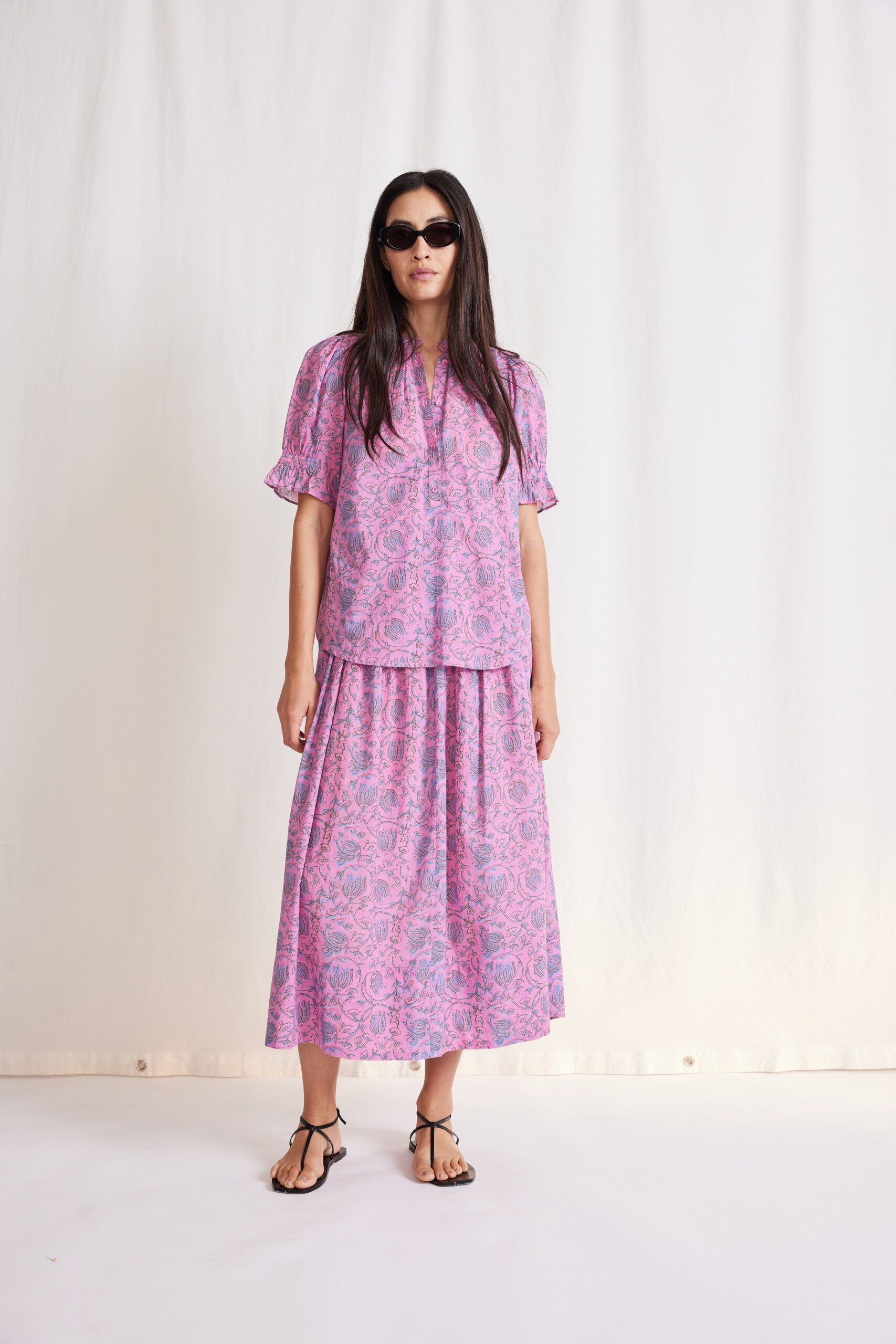 pink short-sleeve collared relaxed printed top