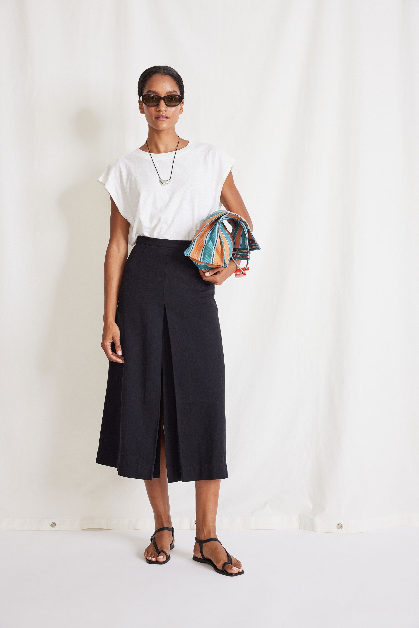 white cotton top and black skirt
