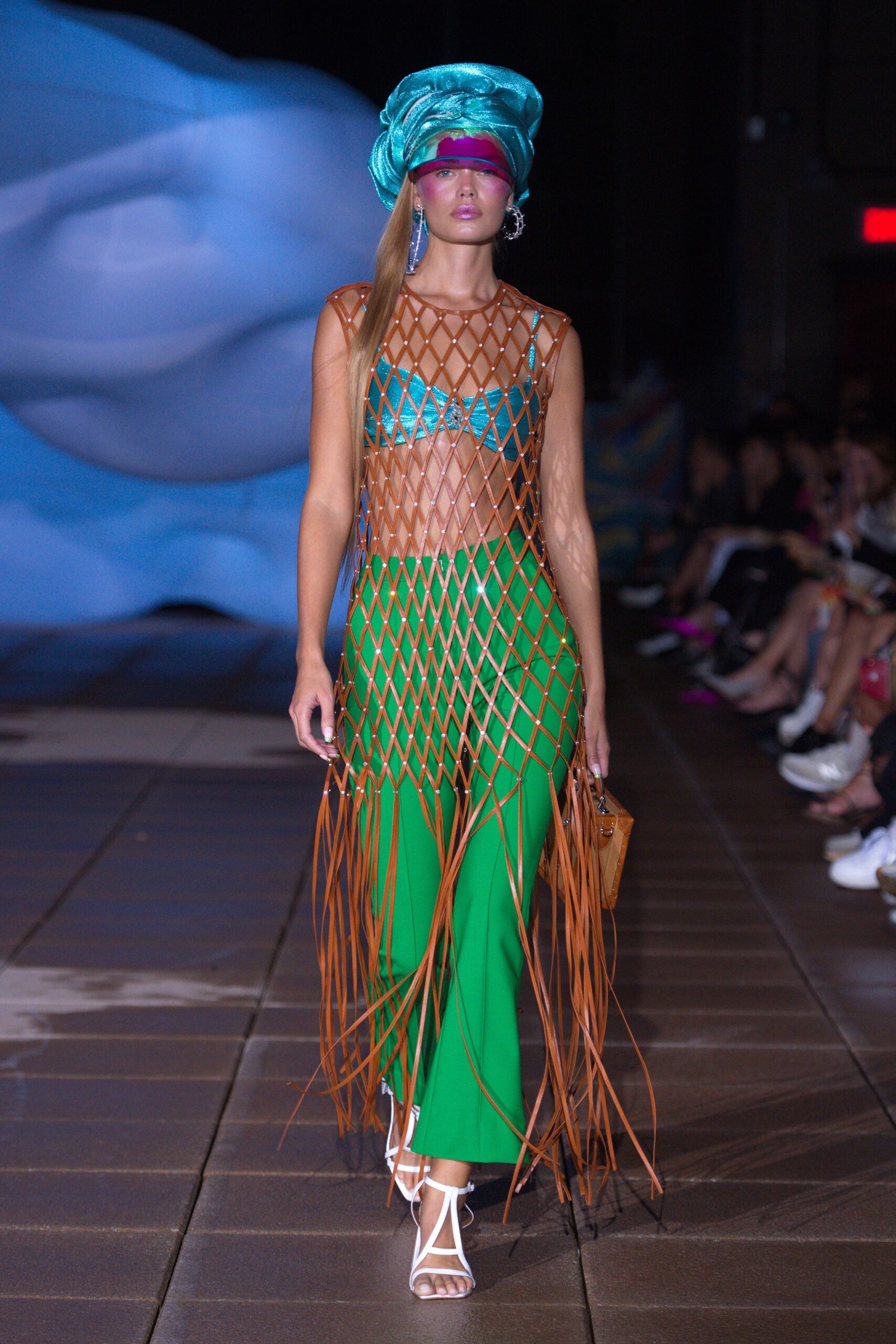 blue silk halter top with green flared pants