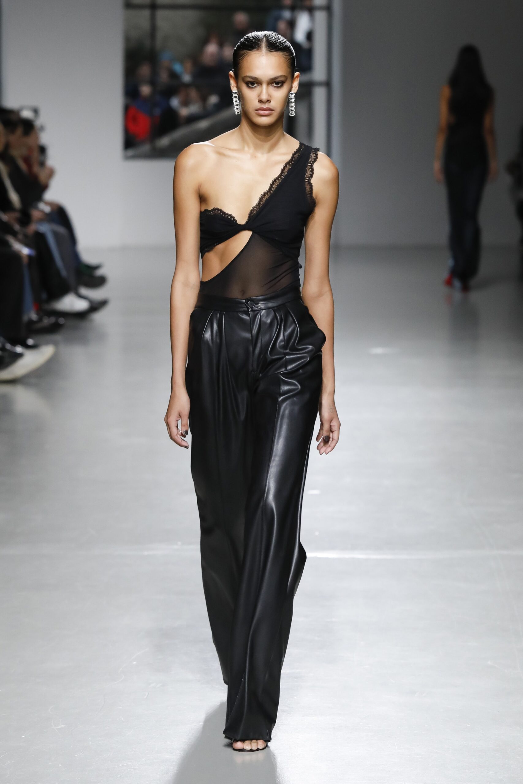 black silk top and leather pants