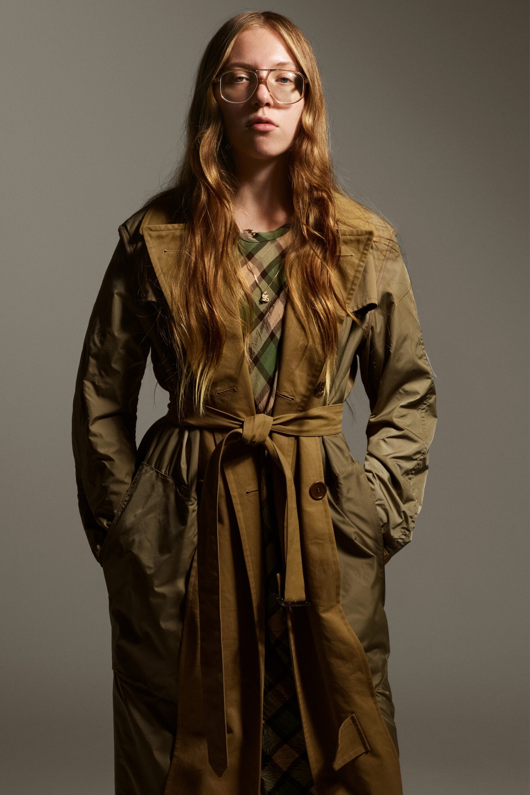 brown trench coat and green dress