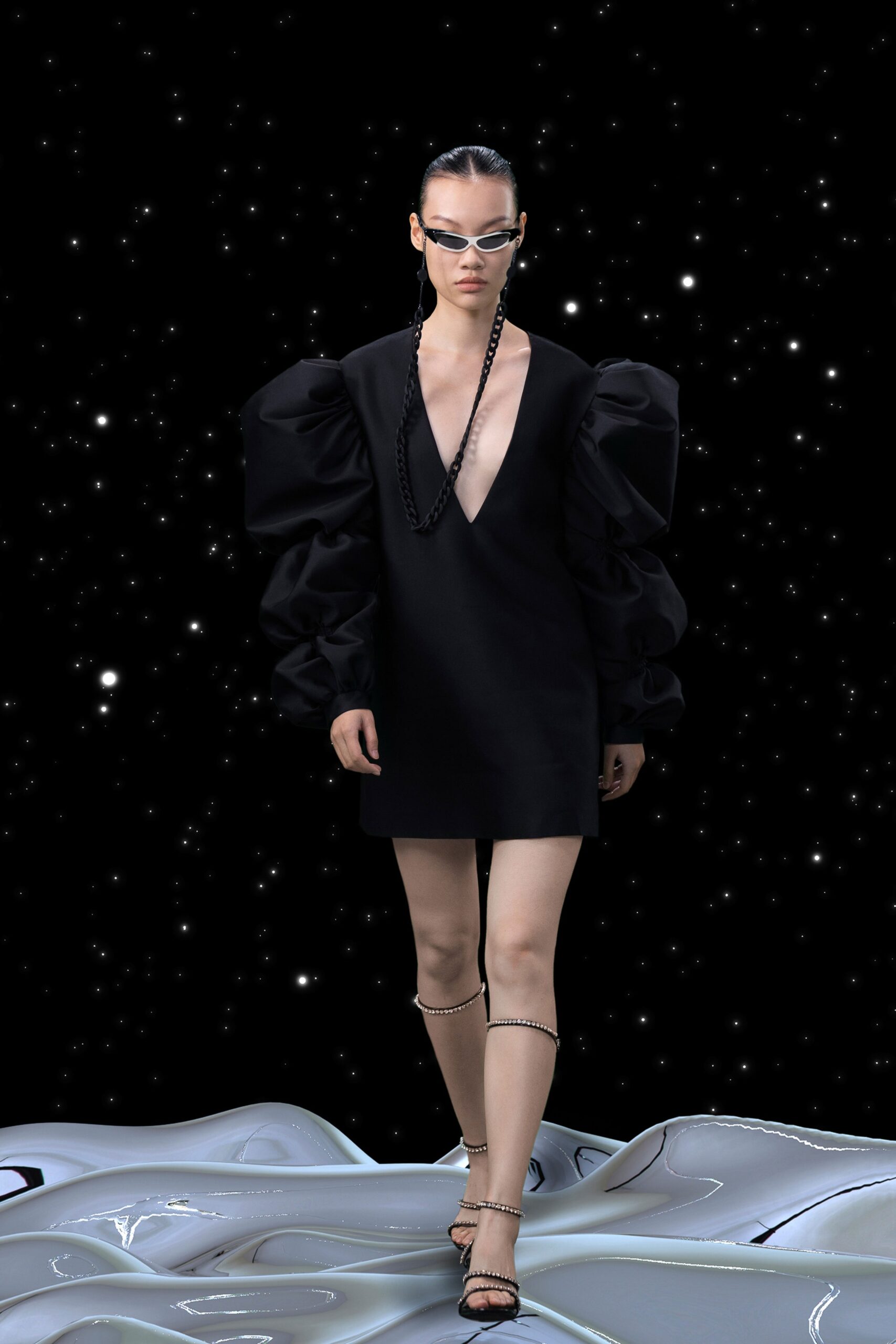 black mini dress with puffed sleeves