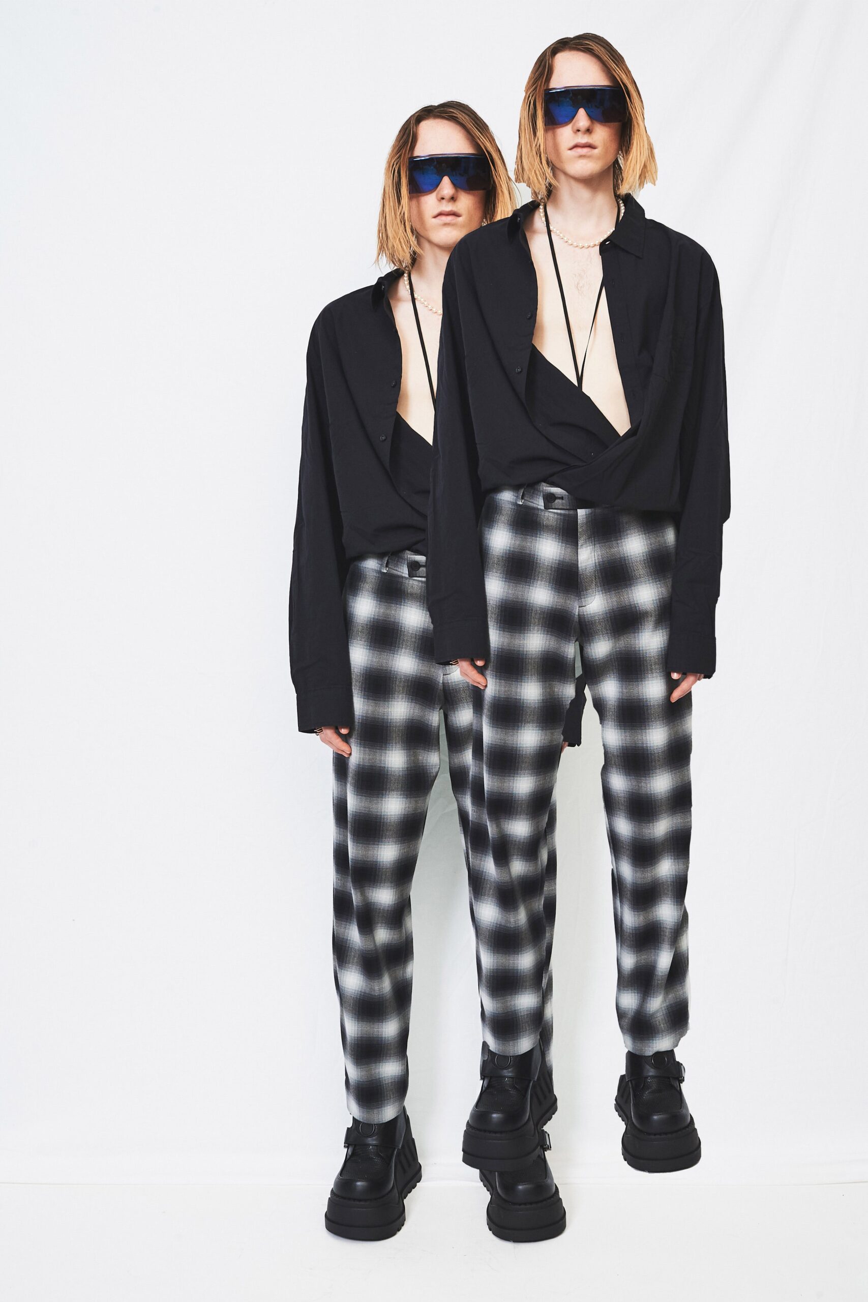 black relaxed shirt with checked pants