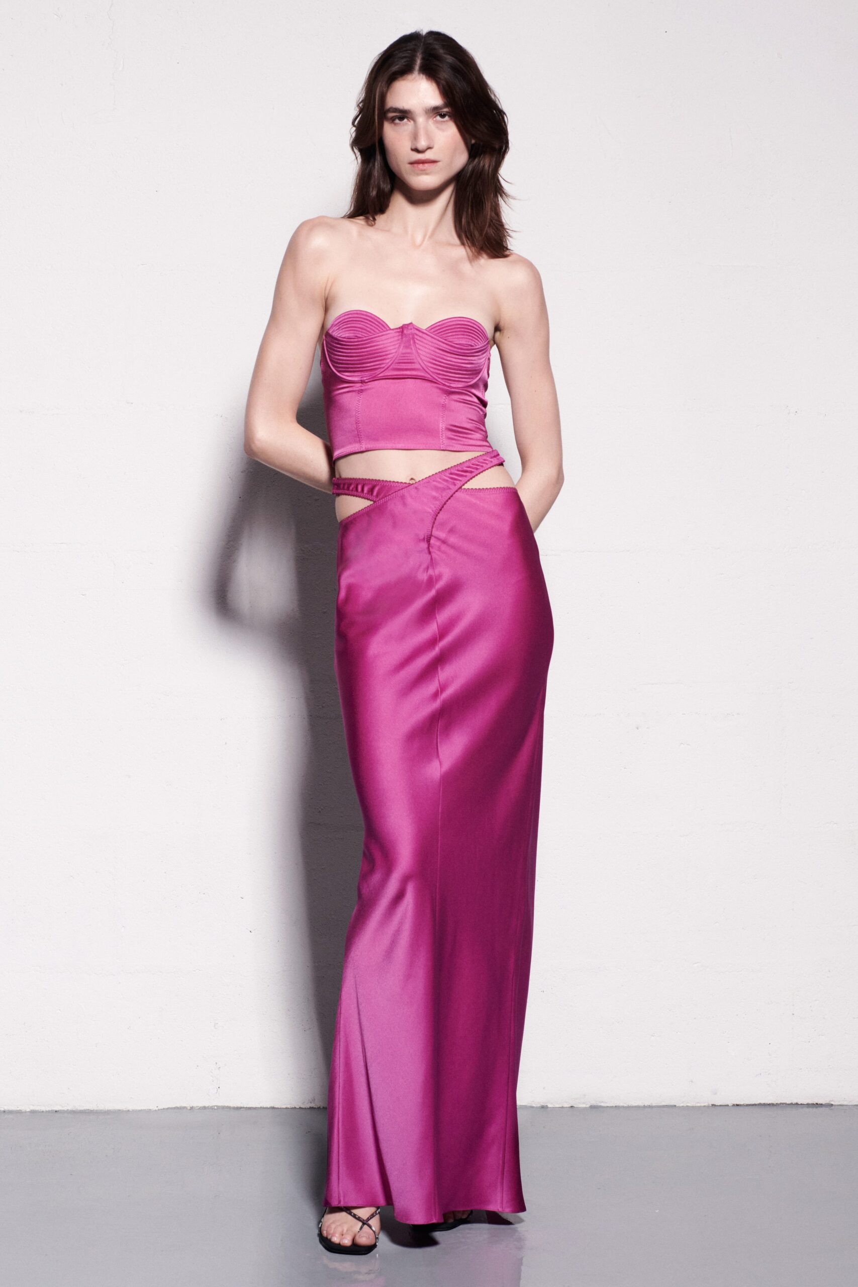 fitted pink silk top and skirt