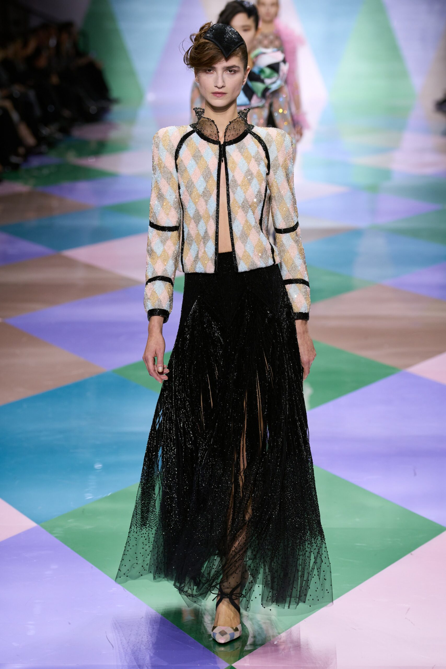 black silk fitted high-waisted pleated layered flowing skirt