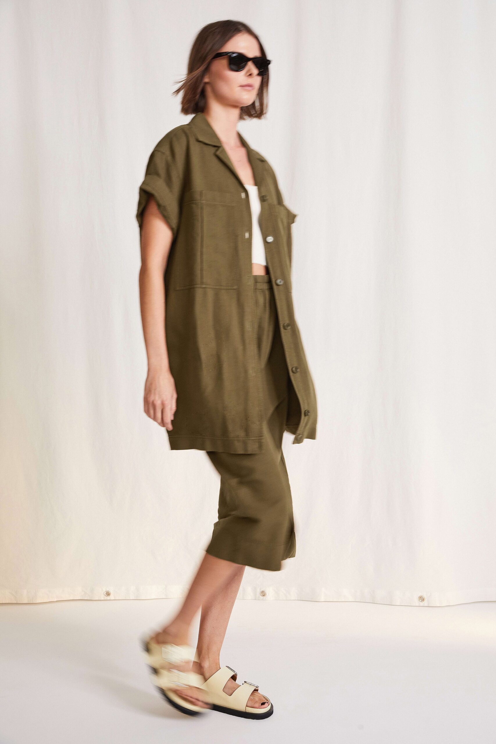 green cotton short-sleeve collared relaxed buttoned shirt