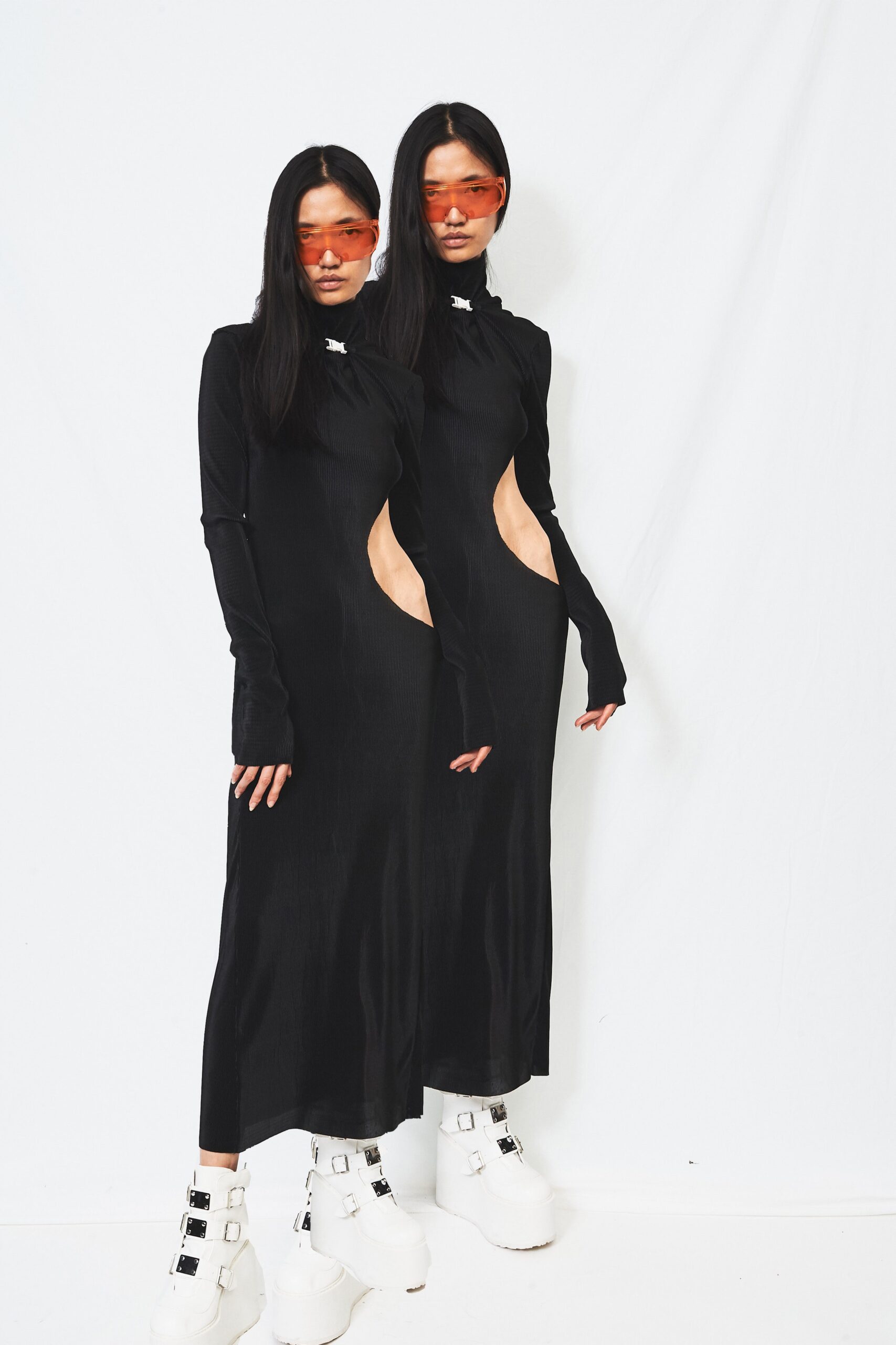 black fitted dress with cutouts