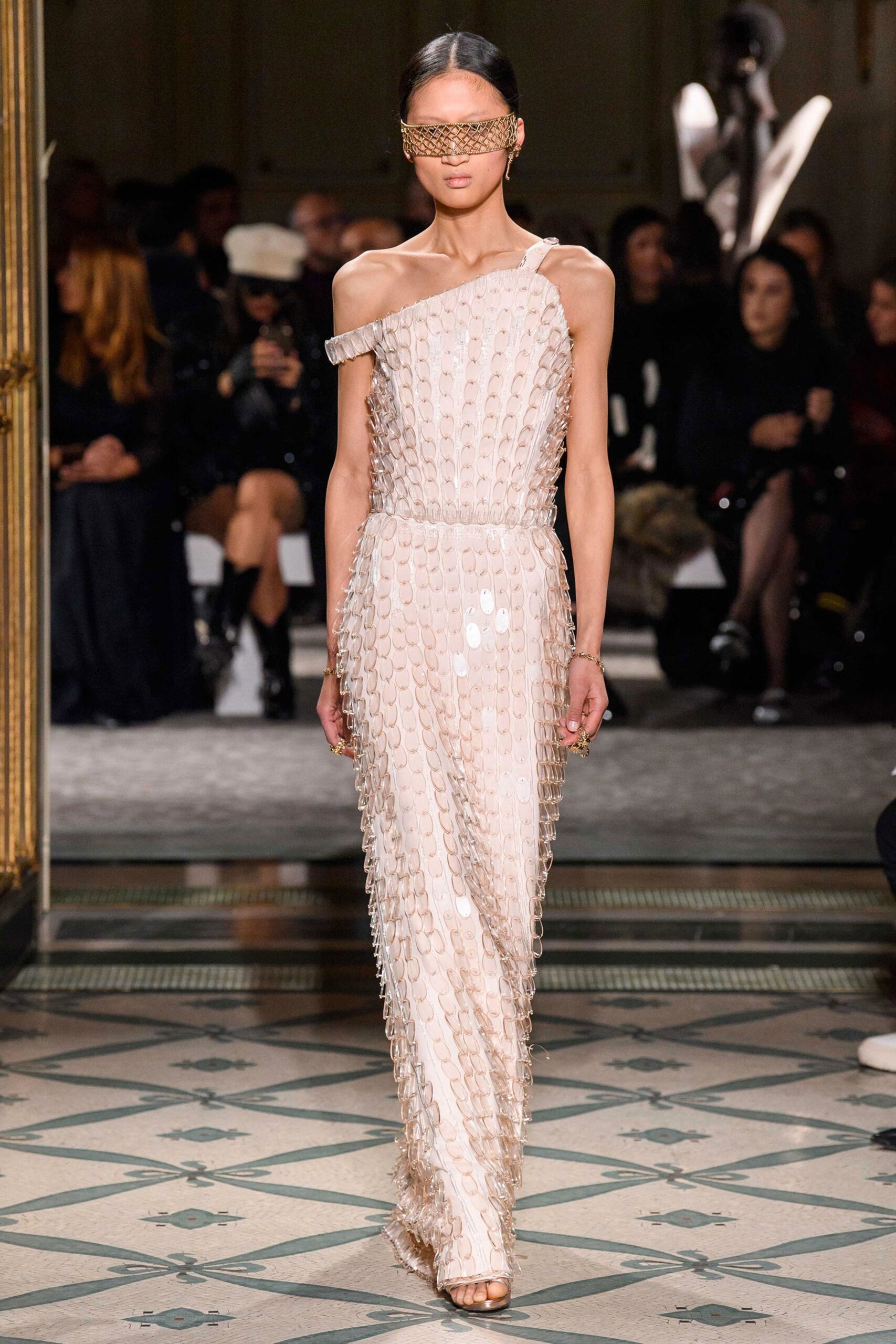 beige sequined off-shoulder gown