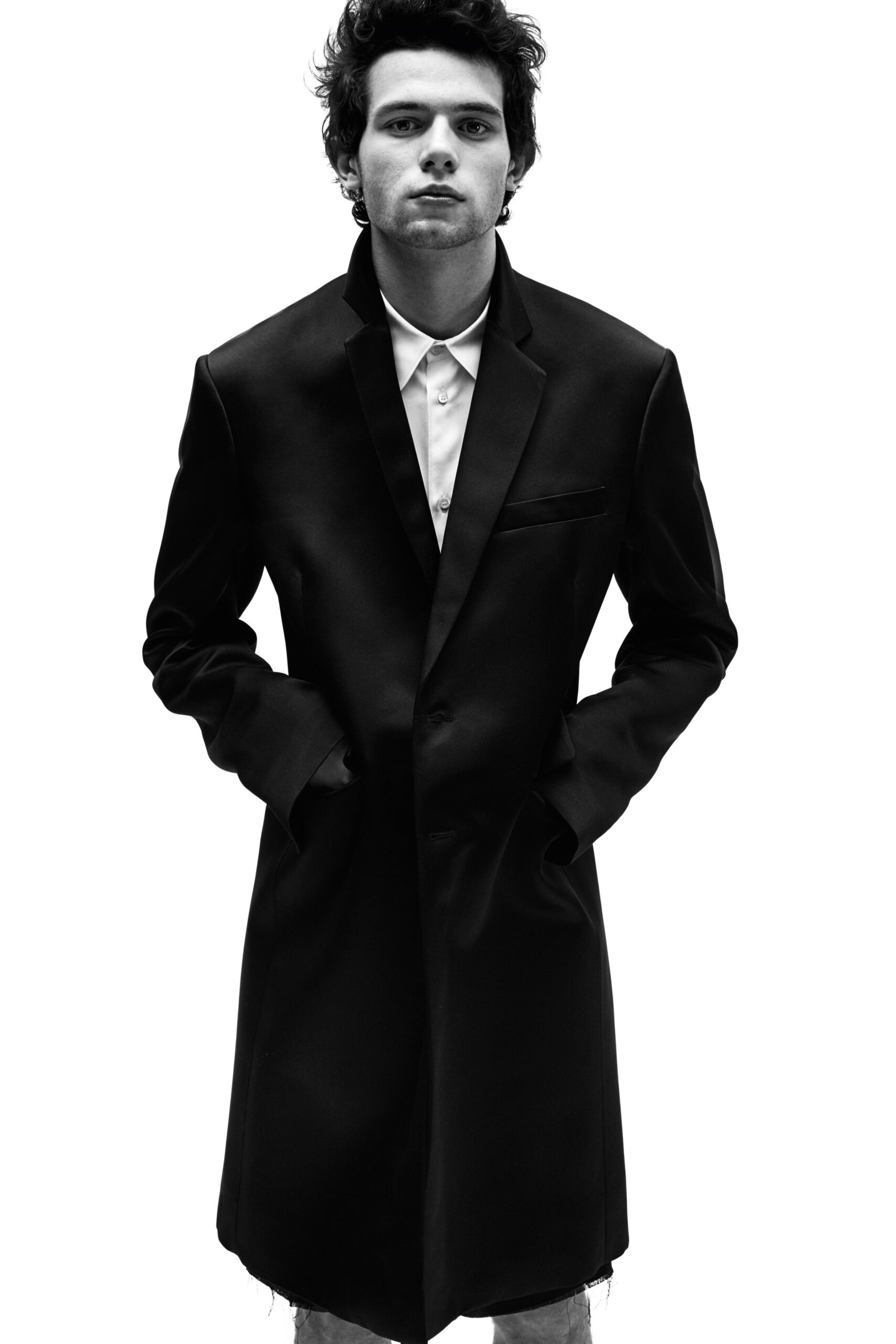 black wool coat and white shirt