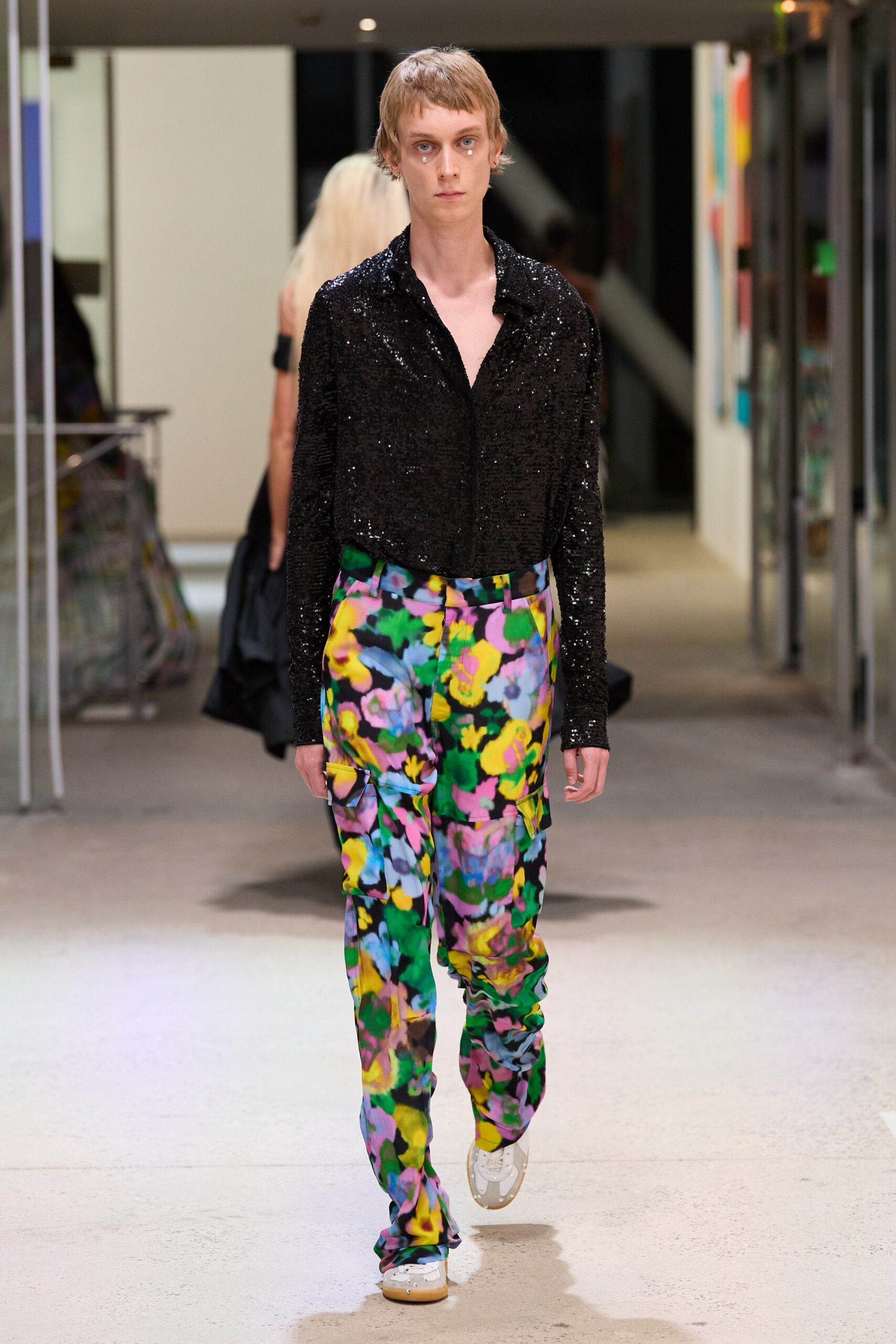 black sequin shirt and multi pants