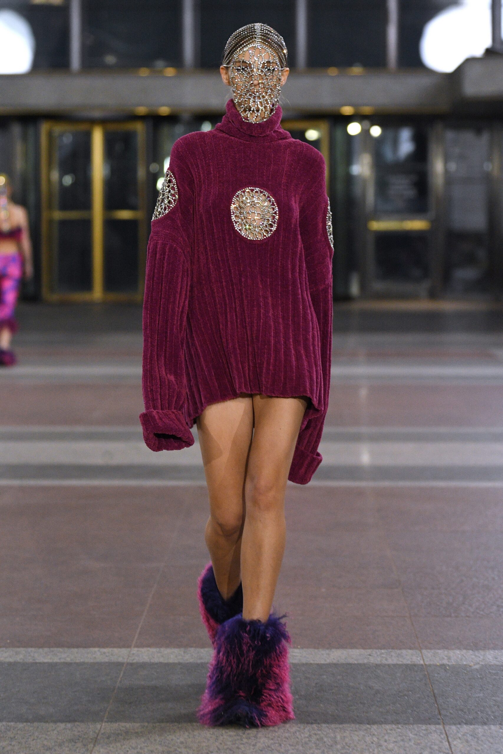 oversized purple sweater and fur boots