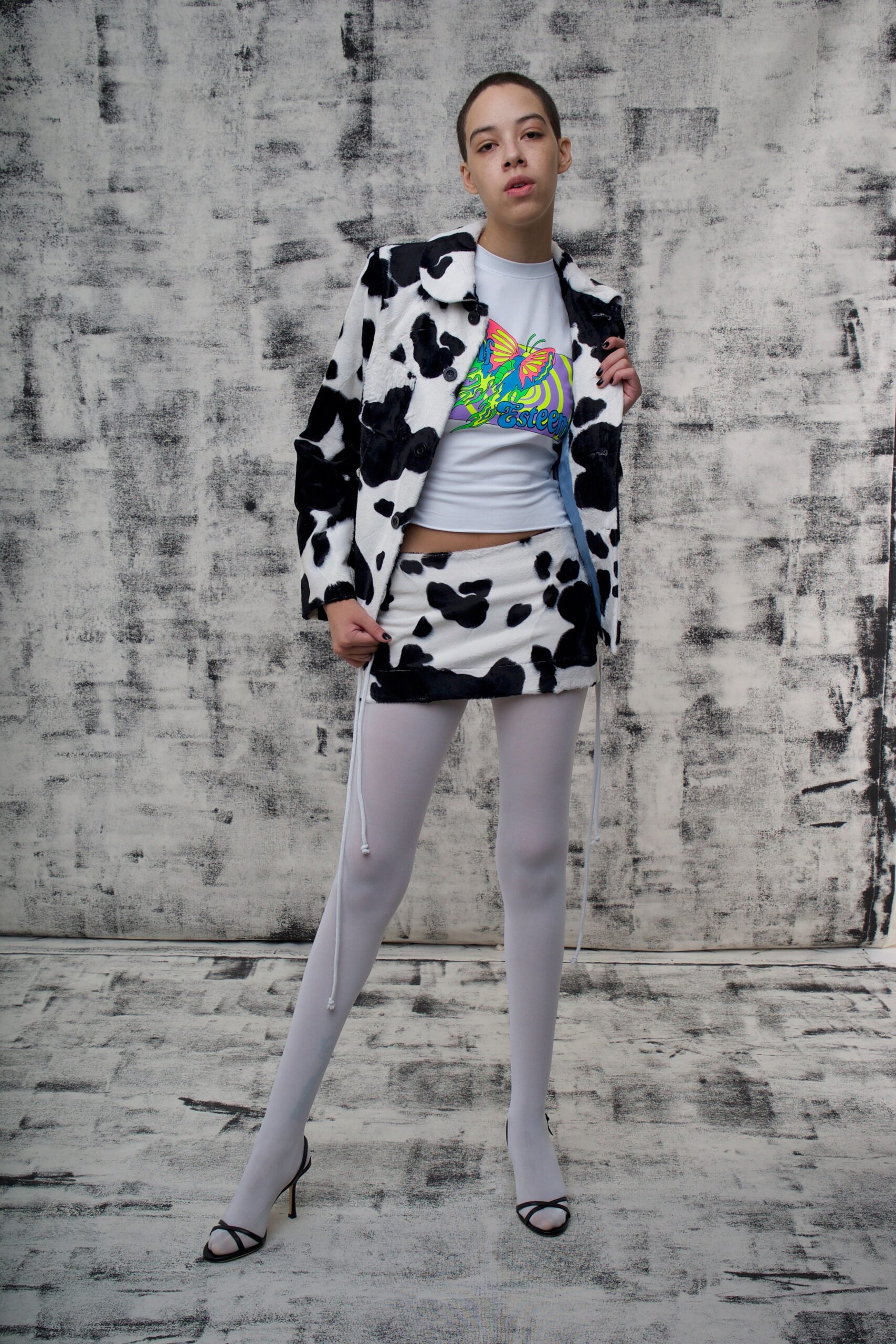 black and white printed blazer and mini skirt