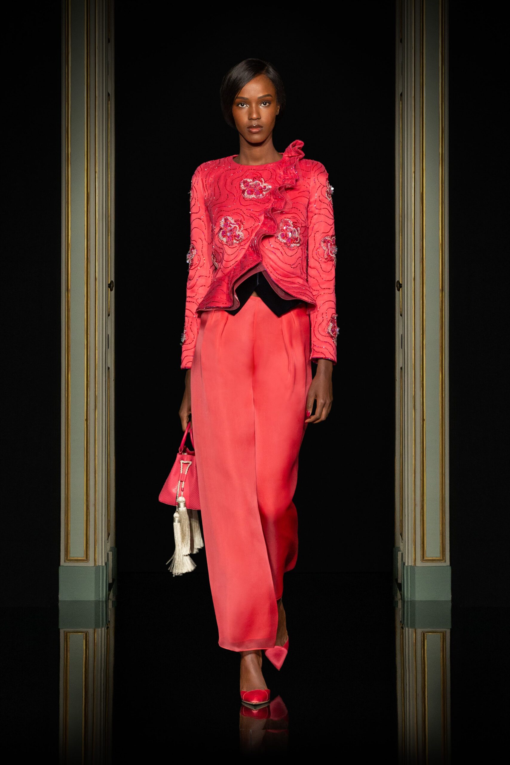 red embroidered jacket with pink pants