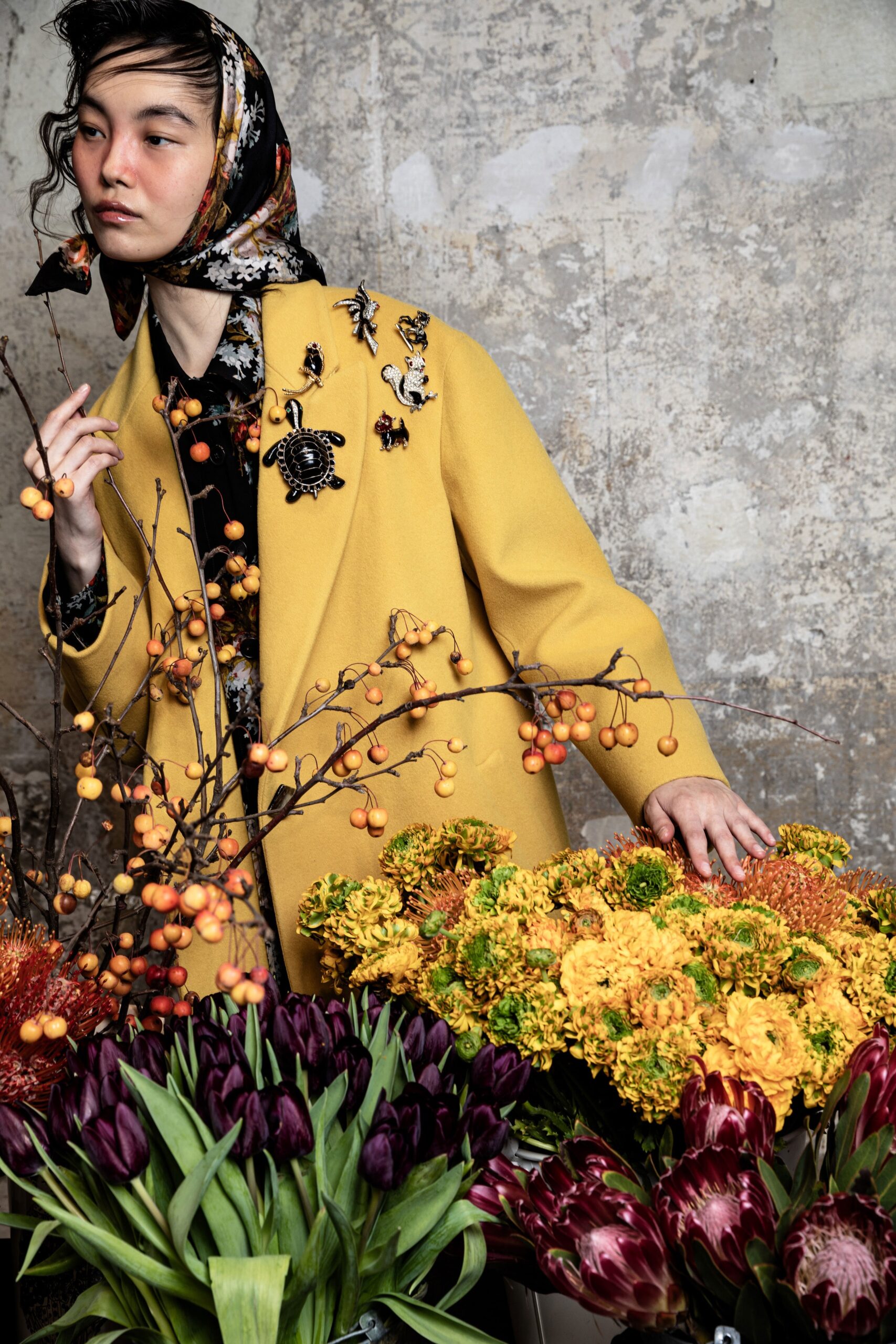 yellow wool fitted coat and black printed shirt