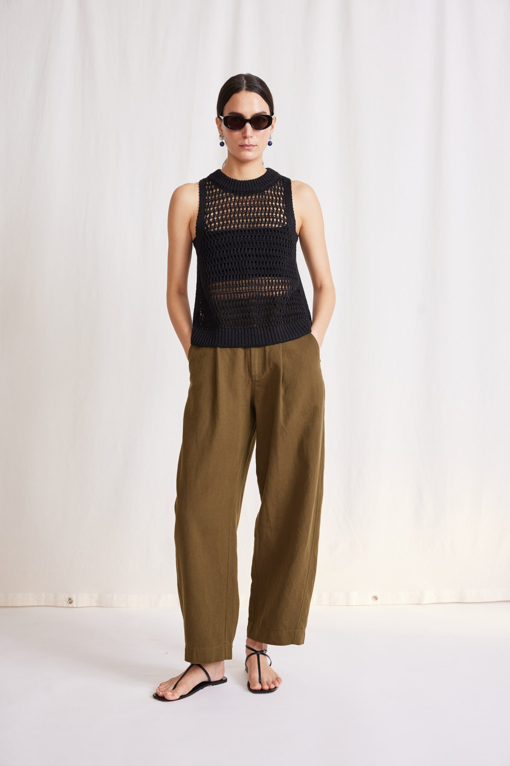 black crochet top with relaxed pants