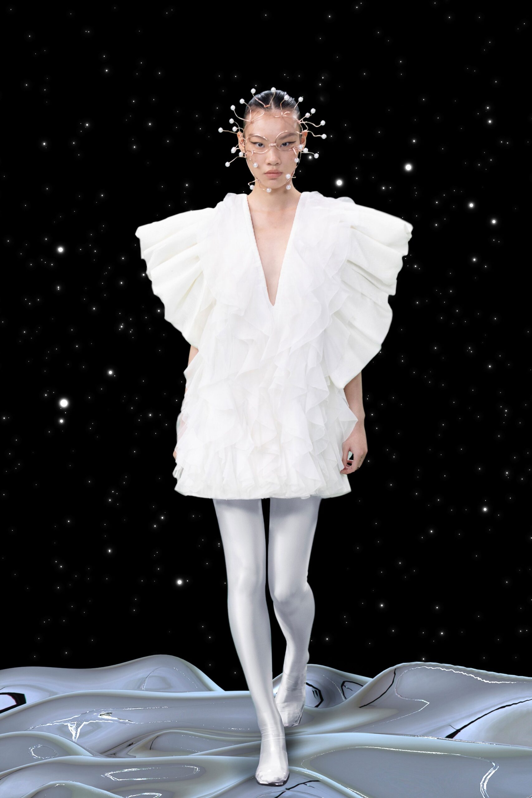 white ruffled mini dress with silver leggings