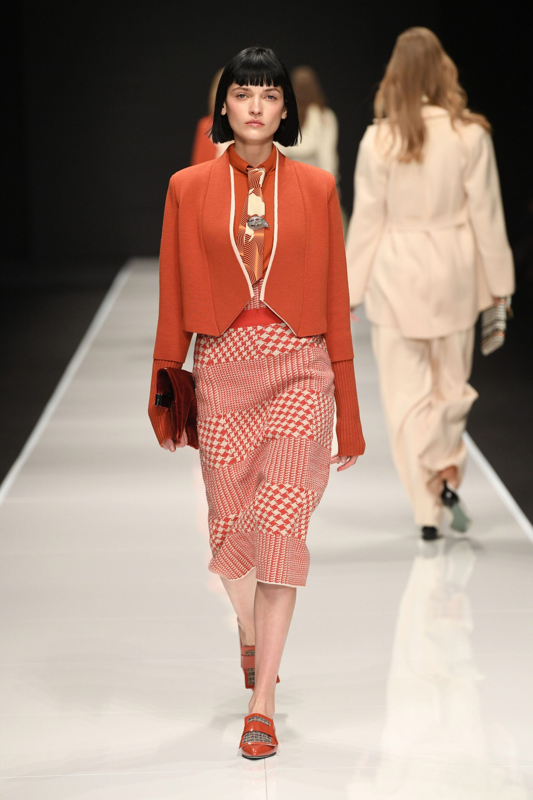 red fitted jacket and pencil skirt