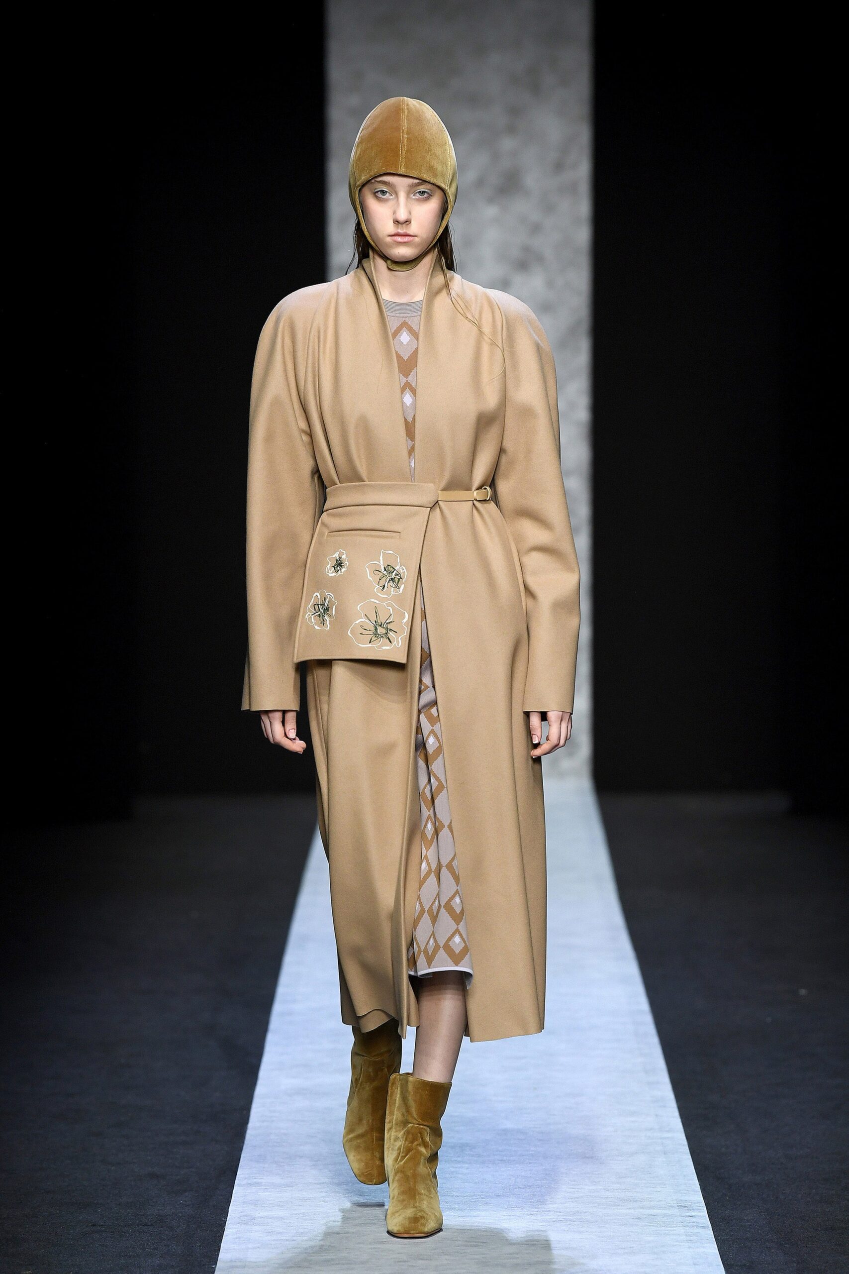 beige wool coat with embroidered dress