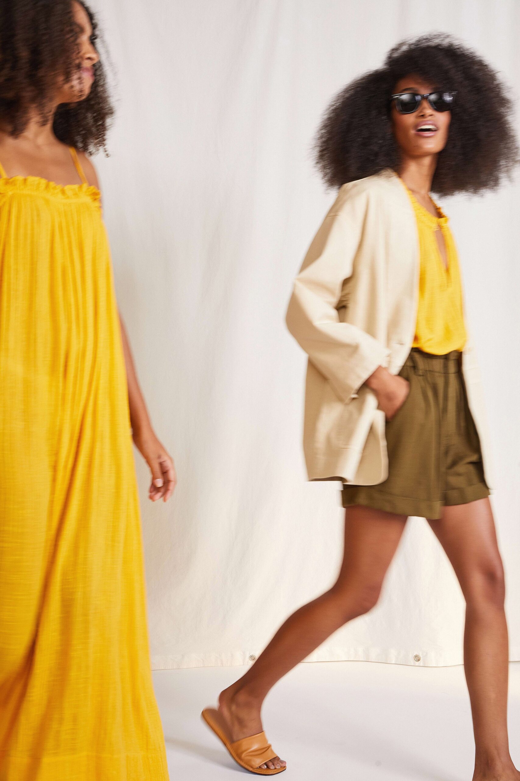 yellow maxi dress and beige blazer