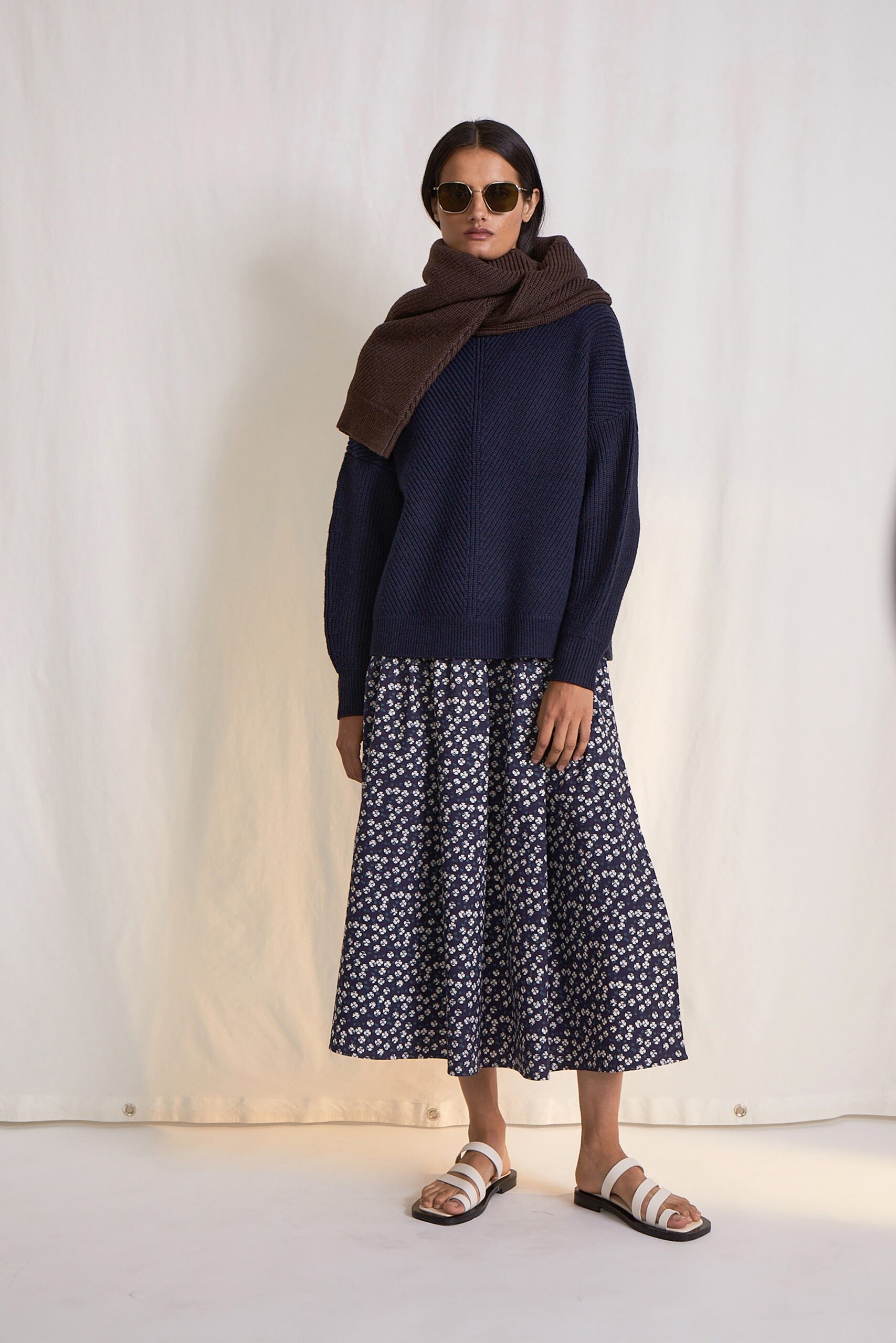 navy sweater with flared skirt