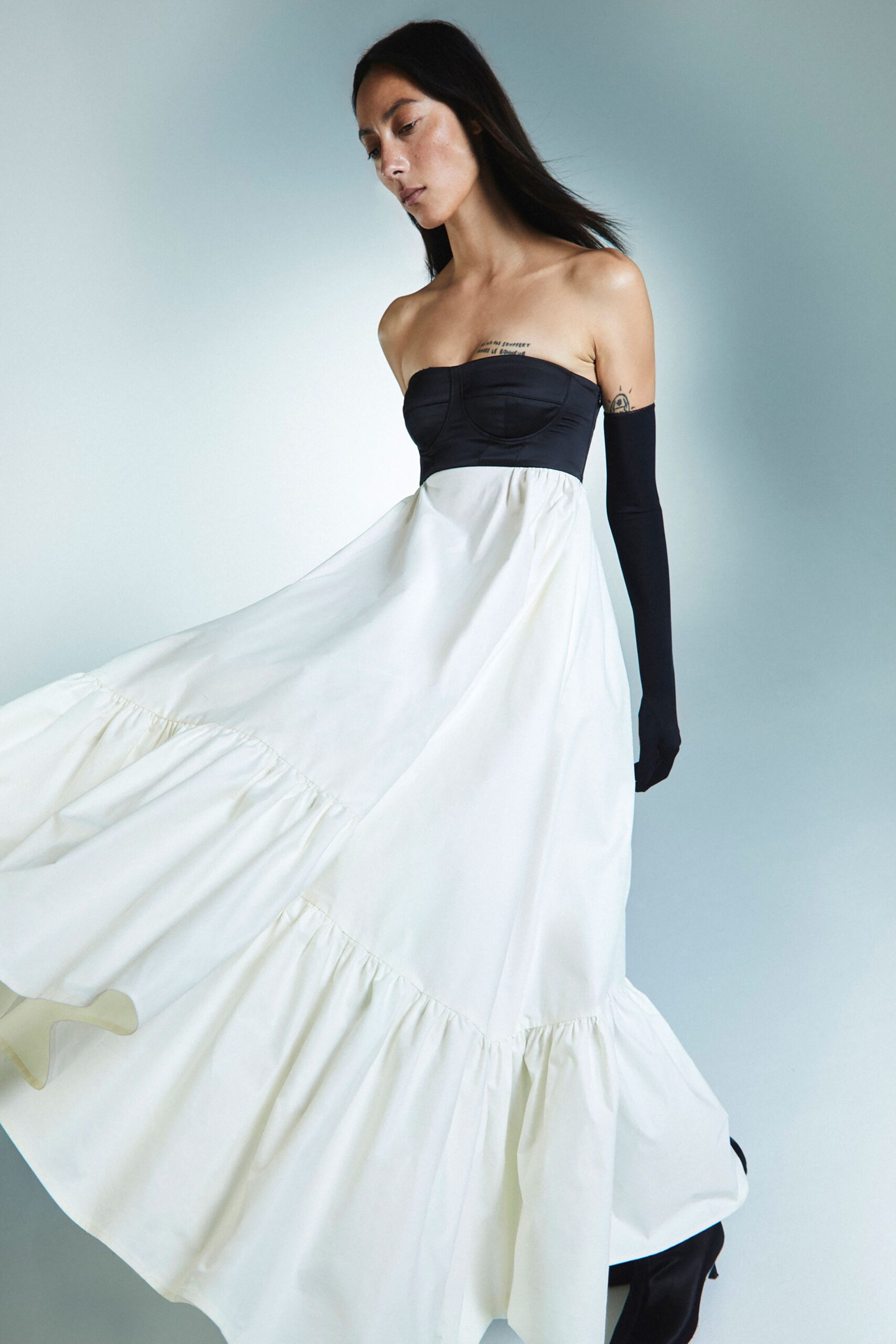 black cotton strapless fitted tiered flowing maxi dress