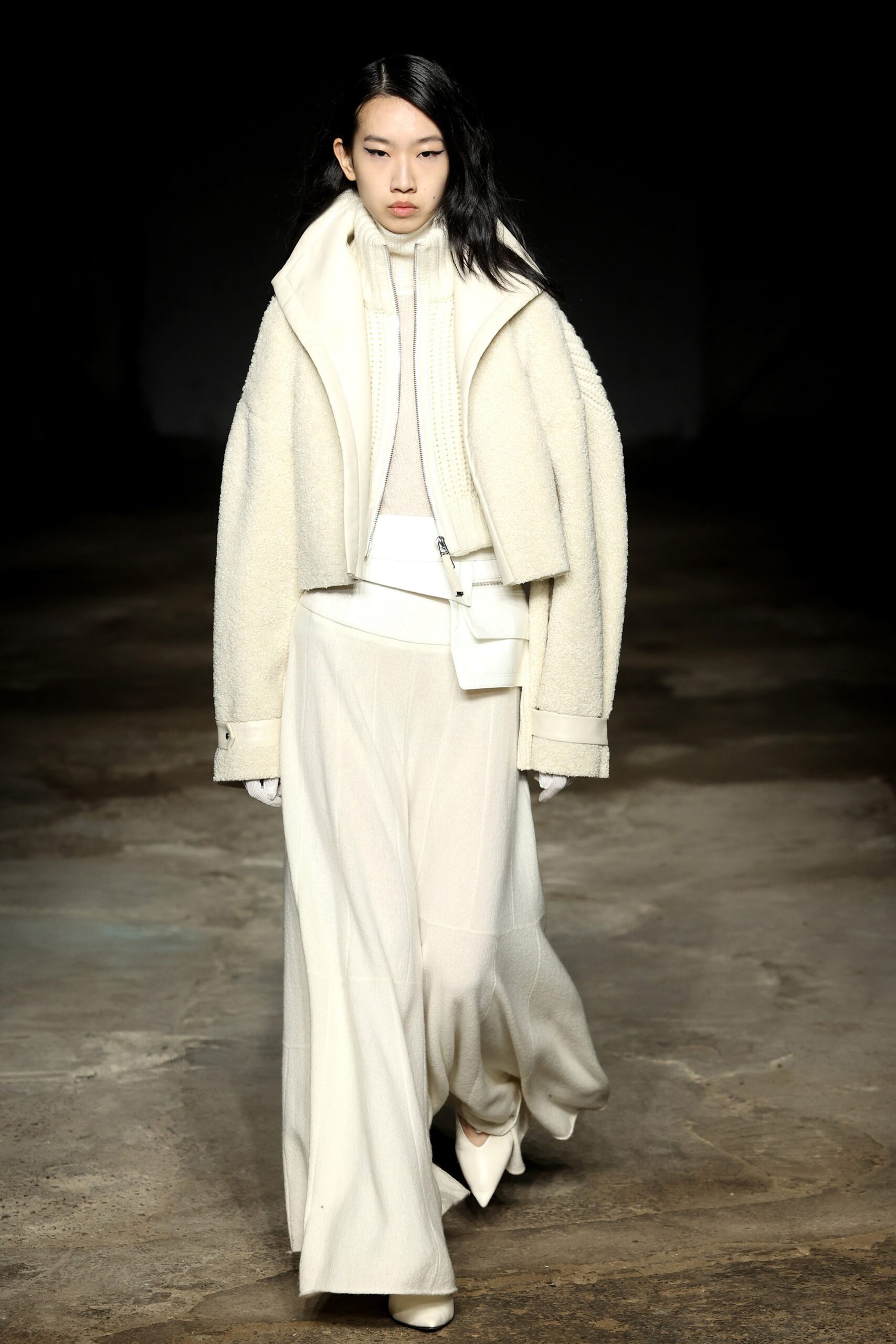 white relaxed jacket and fitted pants
