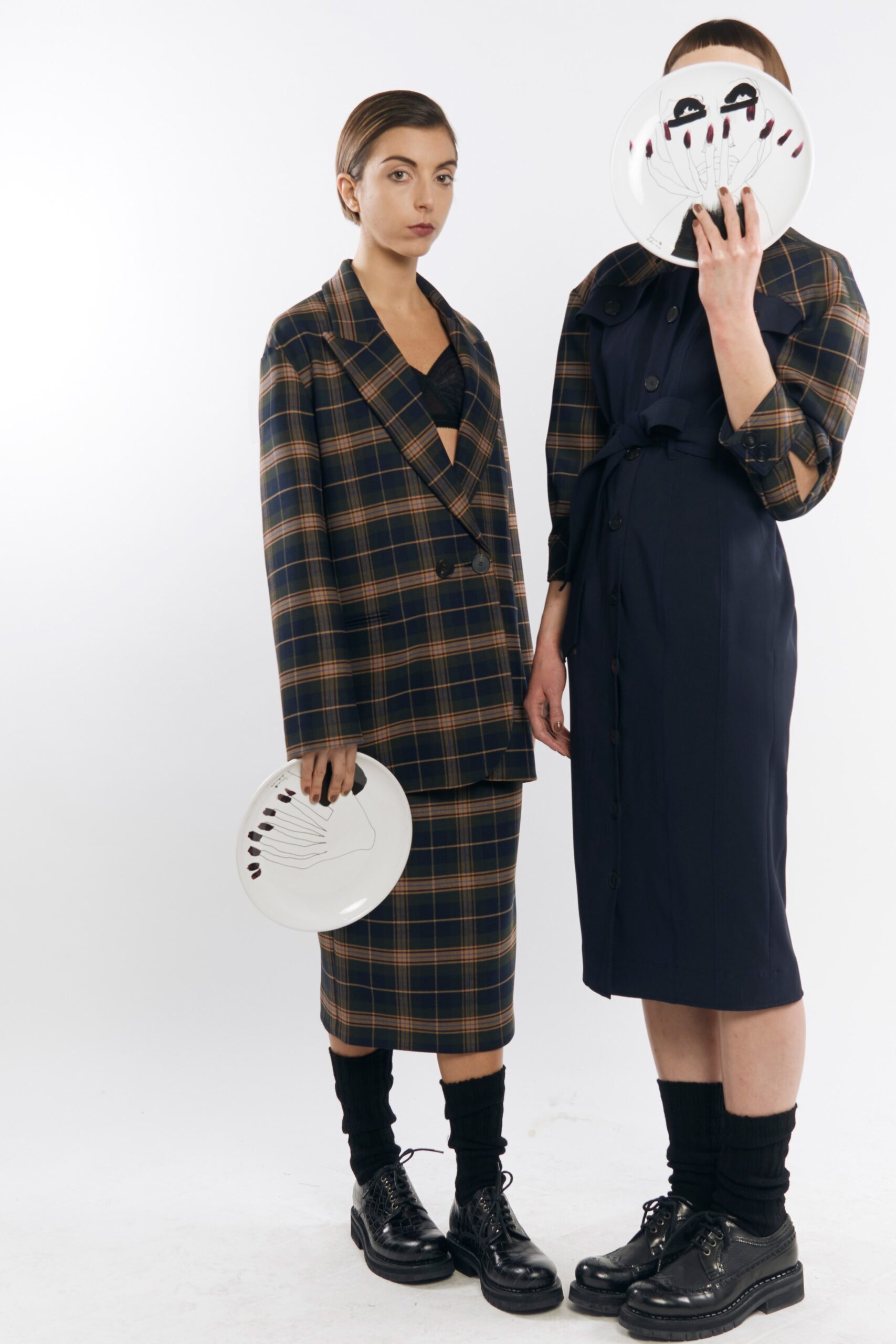 tailored blue plaid blazer and fitted navy dress