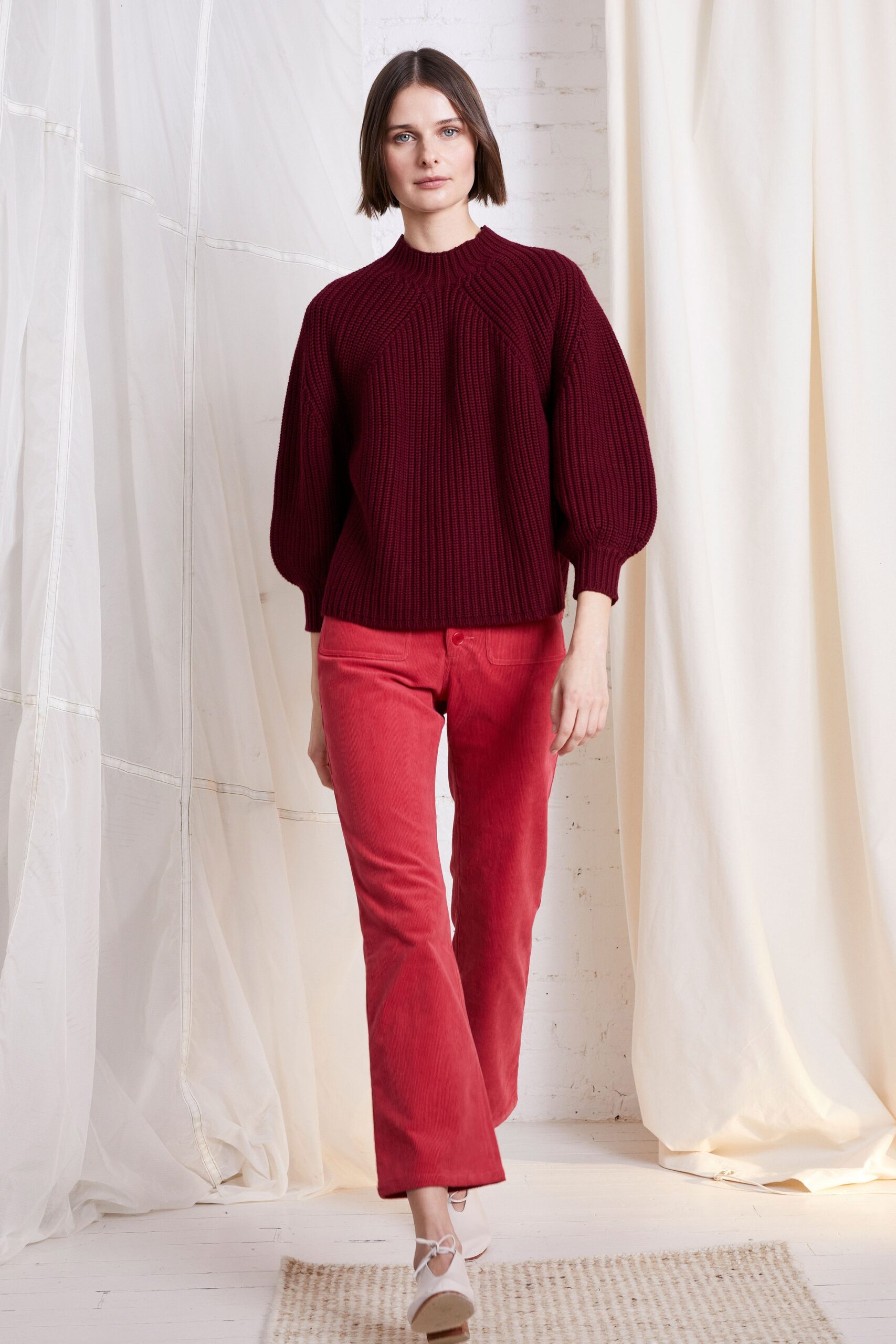 red cotton long-sleeve high-neck relaxed ribbed sweater