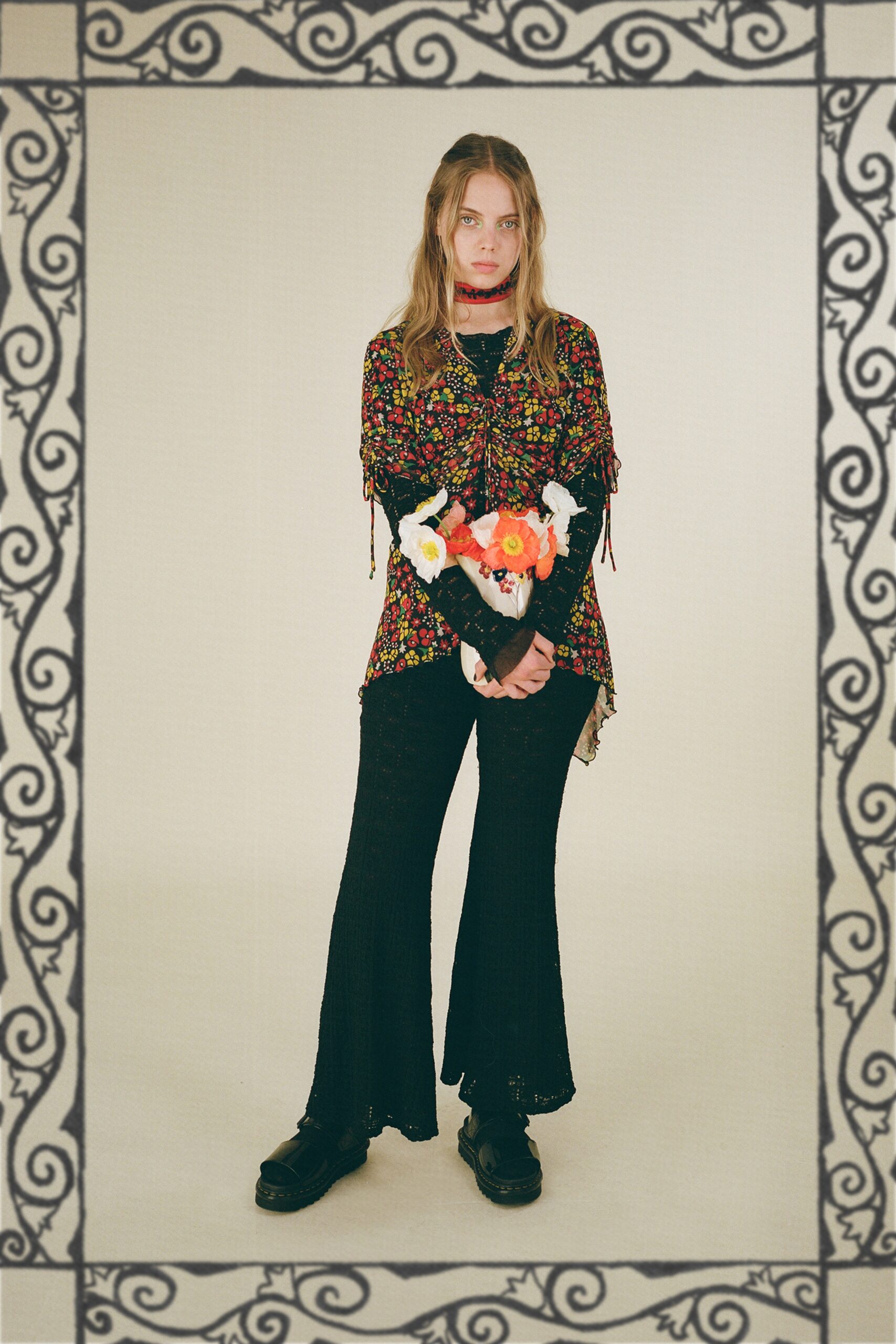 black cotton long-sleeve collared relaxed flared fringed top
