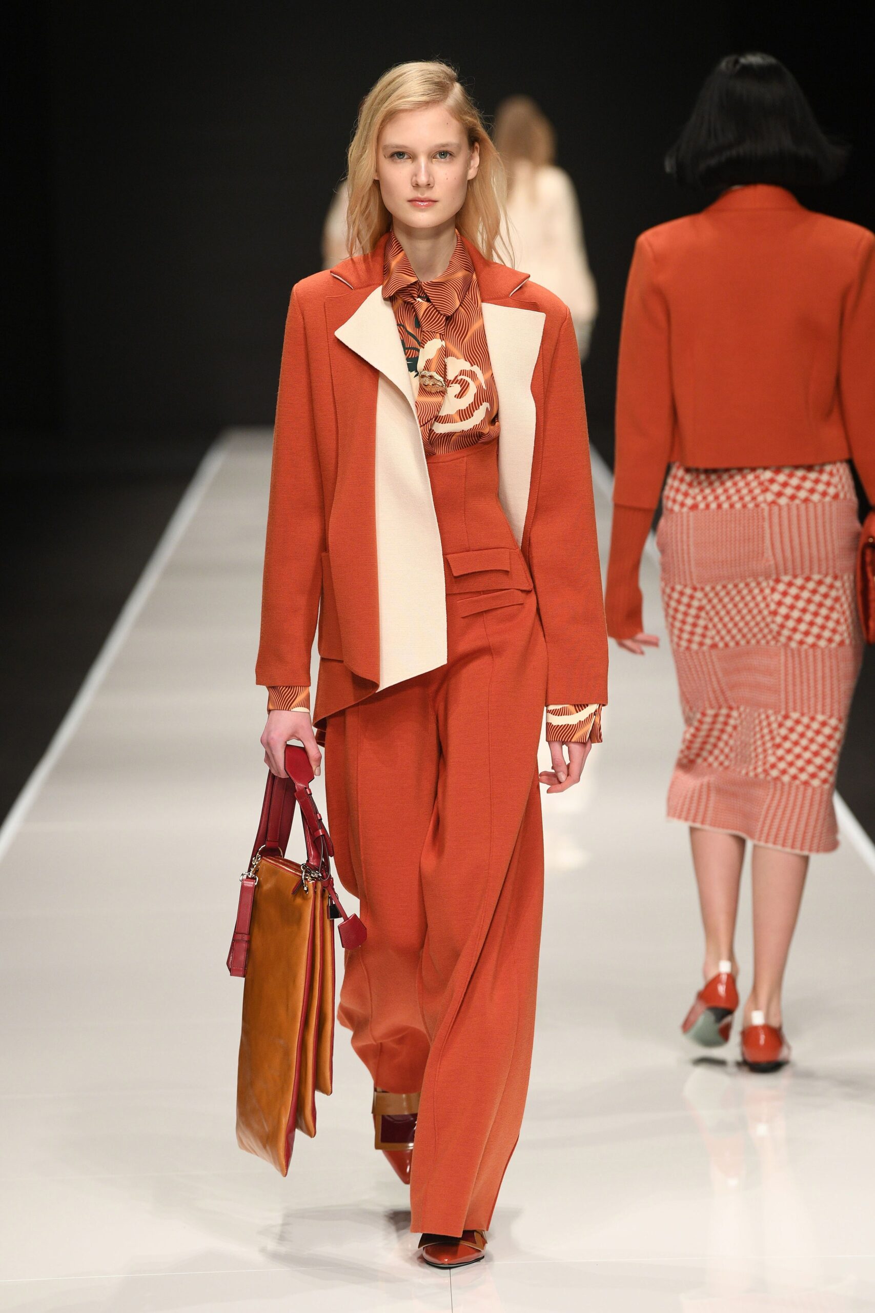 orange tailored suit with printed shirt