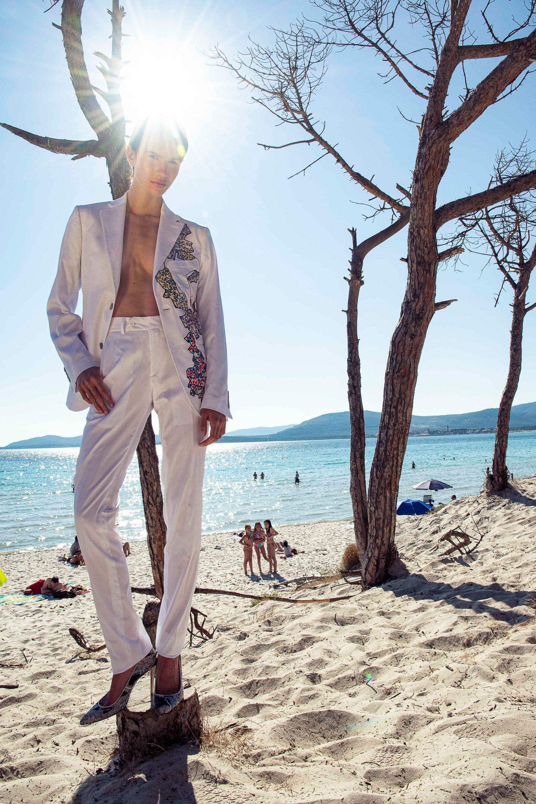 white tailored suit with embroidery