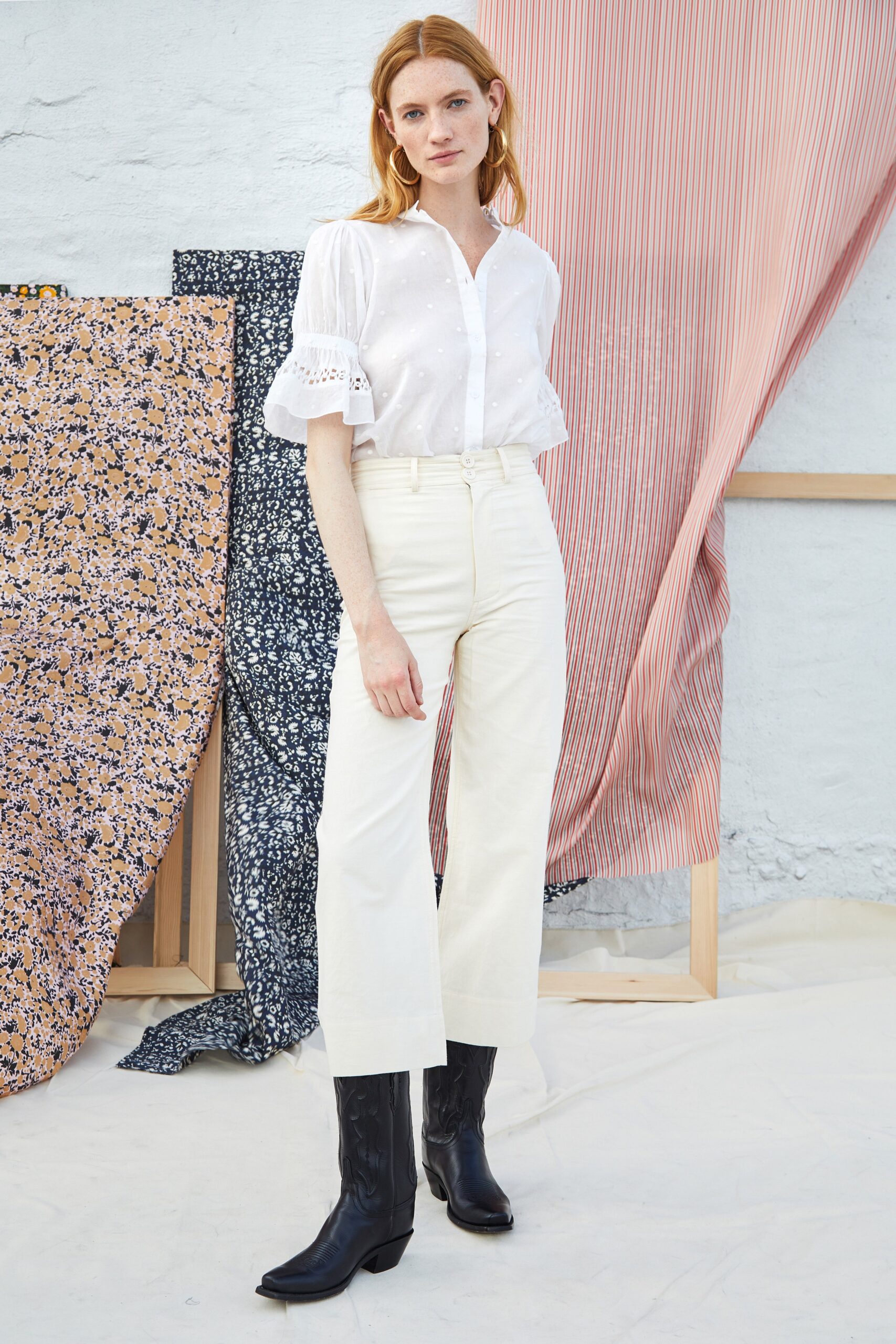 white embroidered blouse beige pants